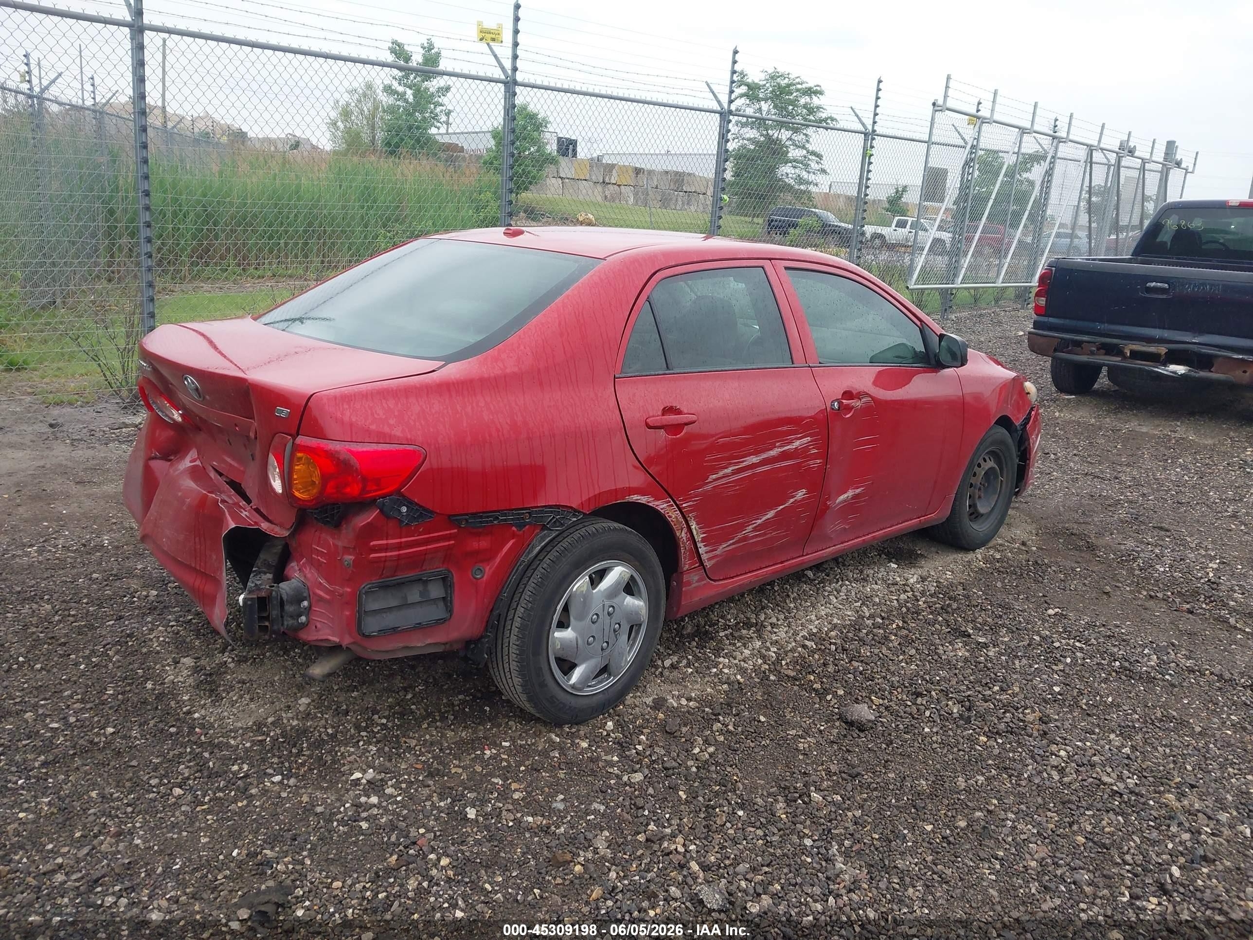 2009 Toyota Corolla Le Red vin: JTDBL40E49J034131