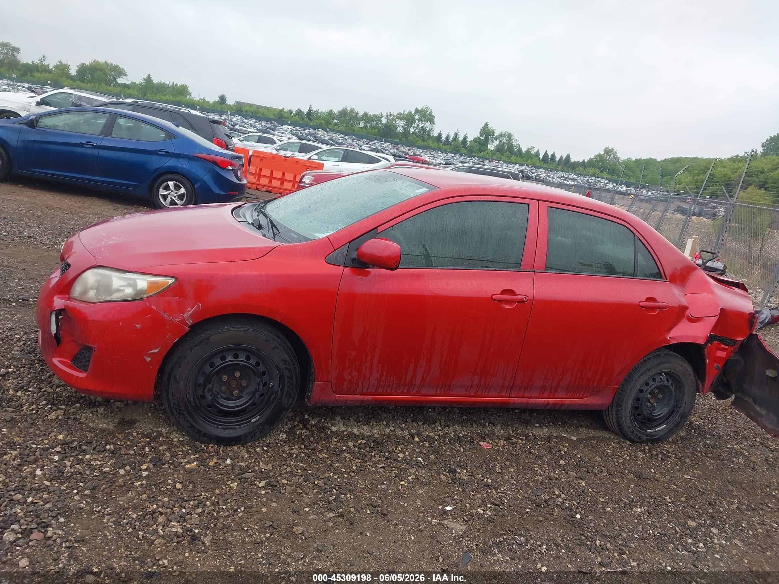 2009 Toyota Corolla Le Red vin: JTDBL40E49J034131