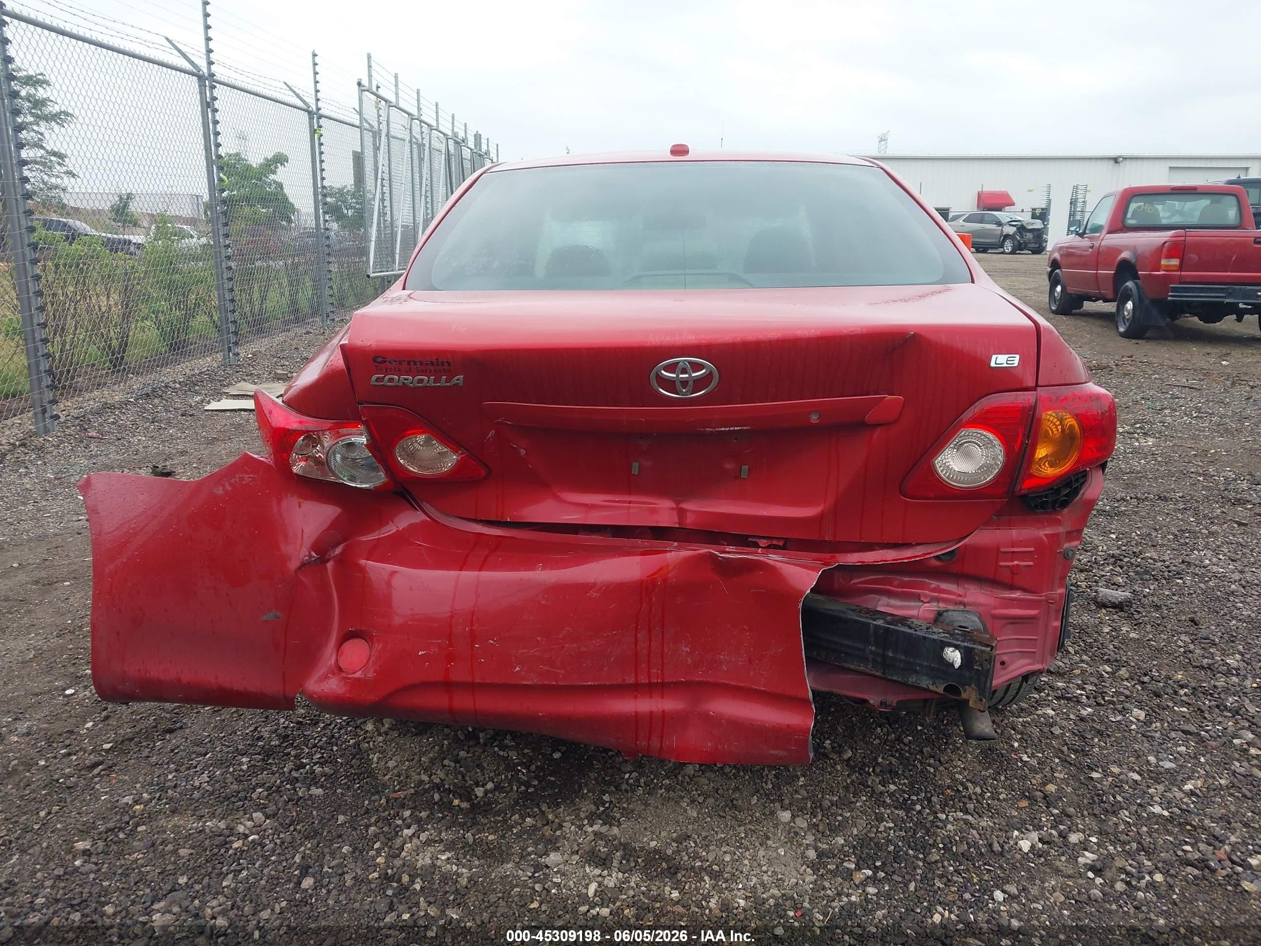 2009 Toyota Corolla Le Red vin: JTDBL40E49J034131