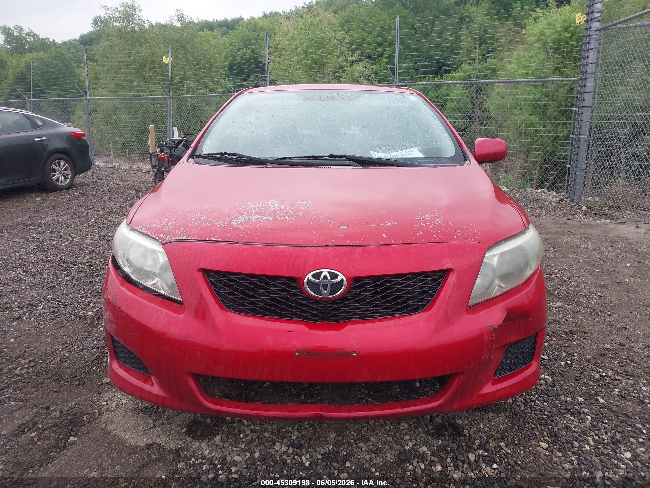 2009 Toyota Corolla Le Red vin: JTDBL40E49J034131