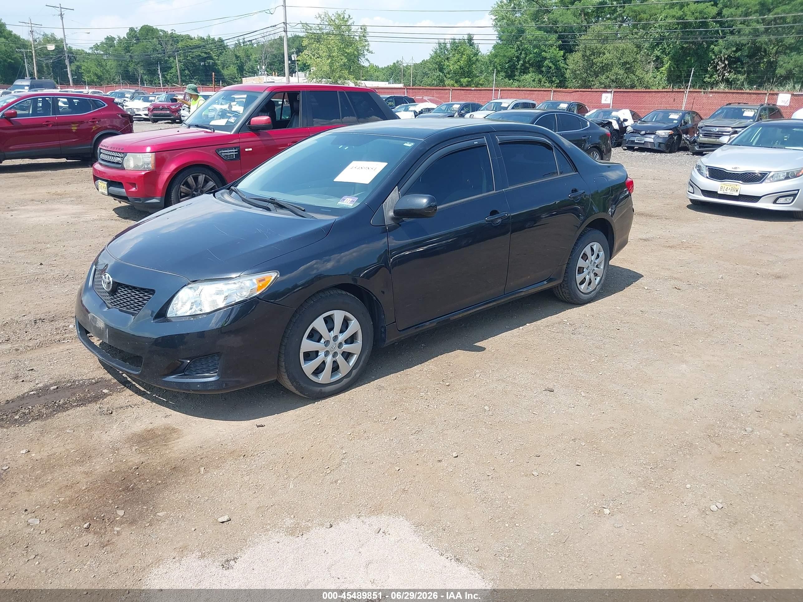 2009 Toyota Corolla Le Black vin: JTDBL40E49J048482