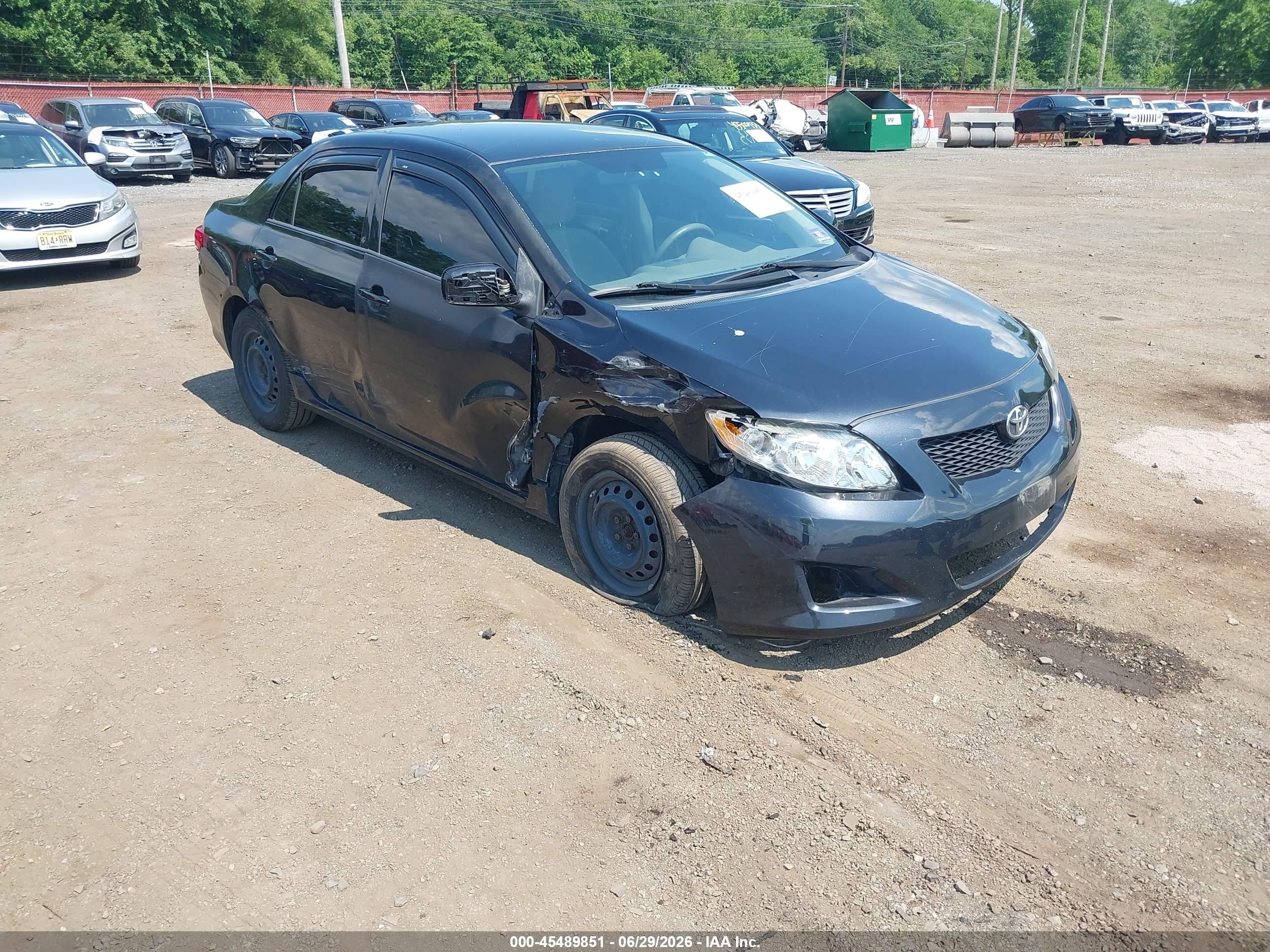 2009 Toyota Corolla Le Black vin: JTDBL40E49J048482