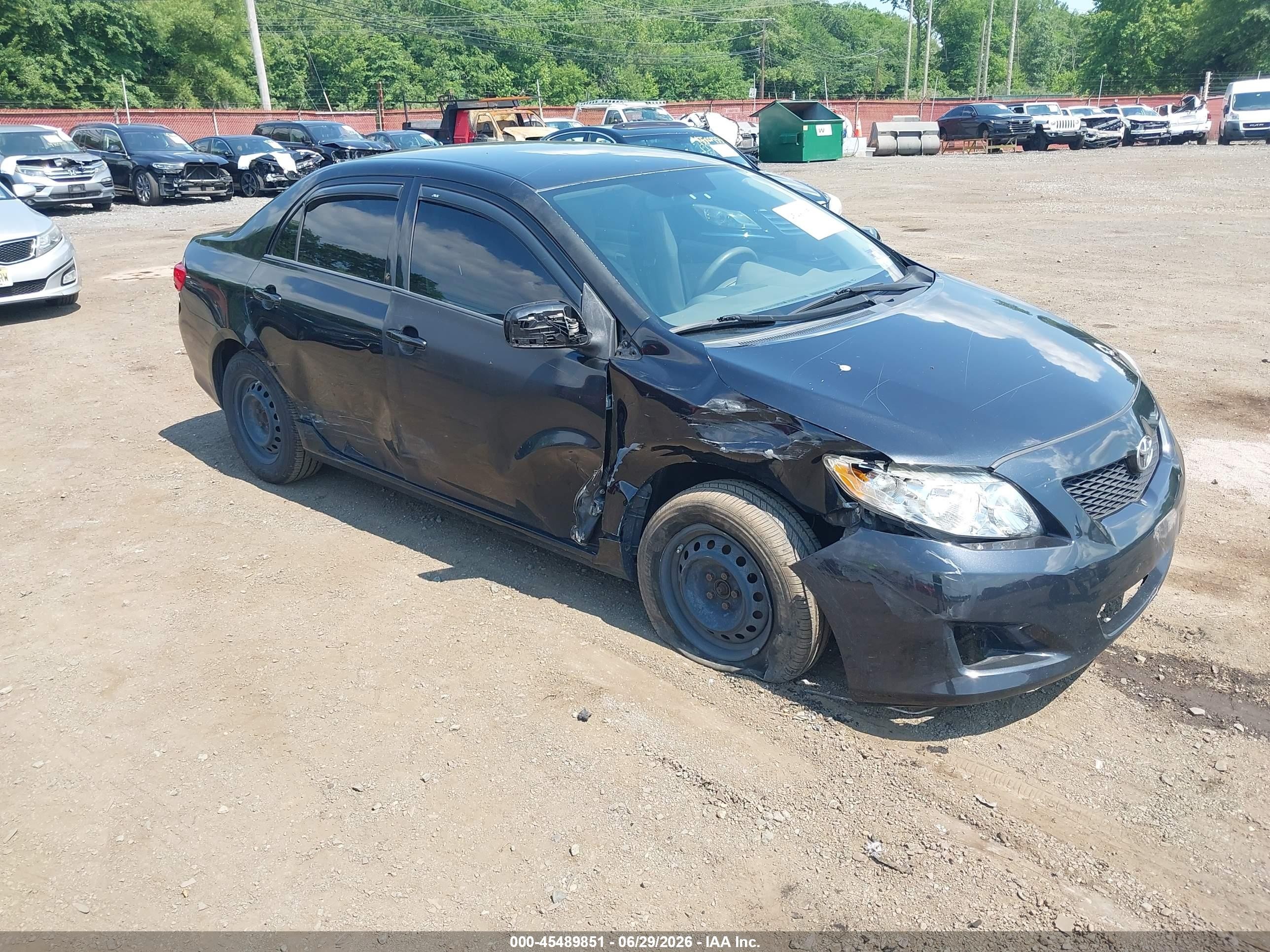 2009 Toyota Corolla Le Black vin: JTDBL40E49J048482