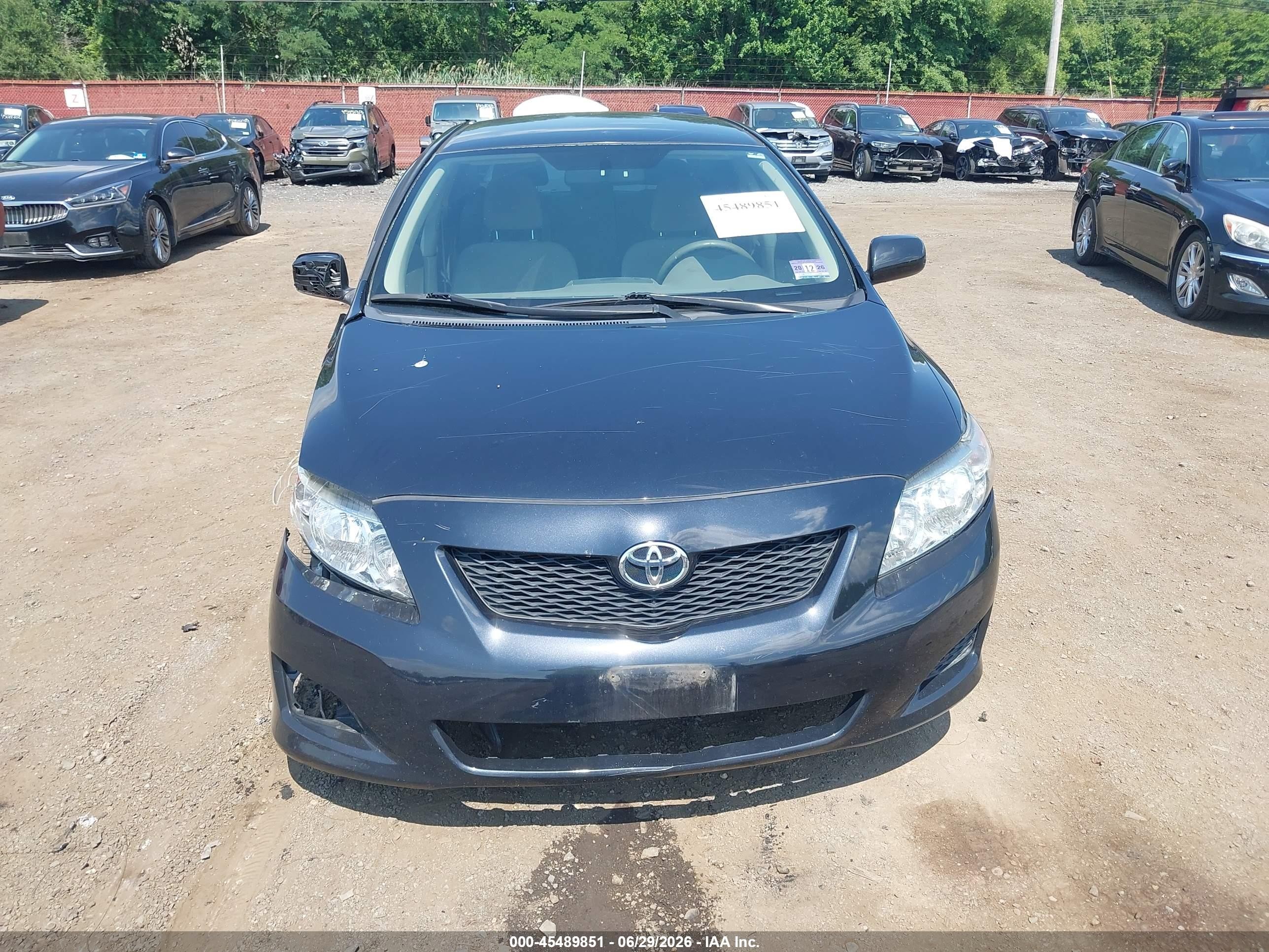 2009 Toyota Corolla Le Black vin: JTDBL40E49J048482