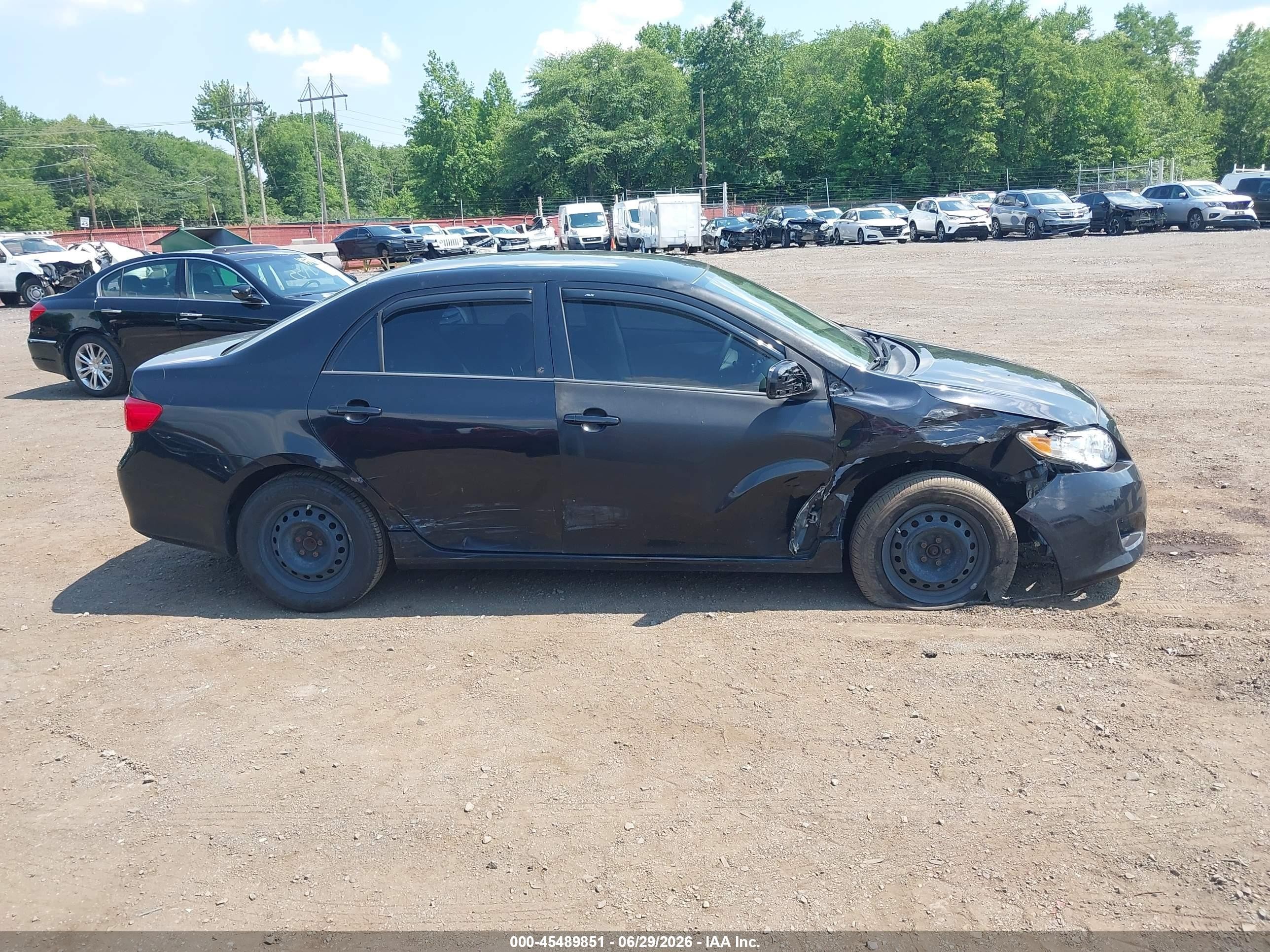 2009 Toyota Corolla Le Black vin: JTDBL40E49J048482