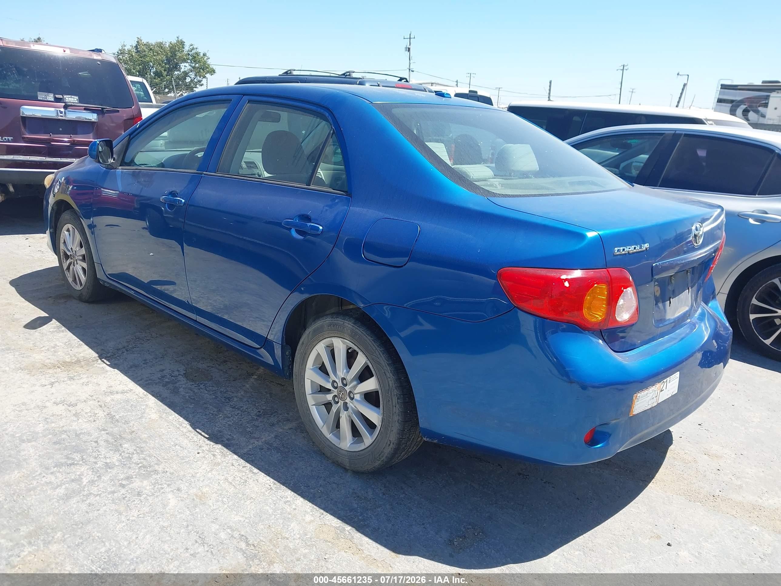2009 Toyota Corolla Le Синий vin: JTDBL40E599019932
