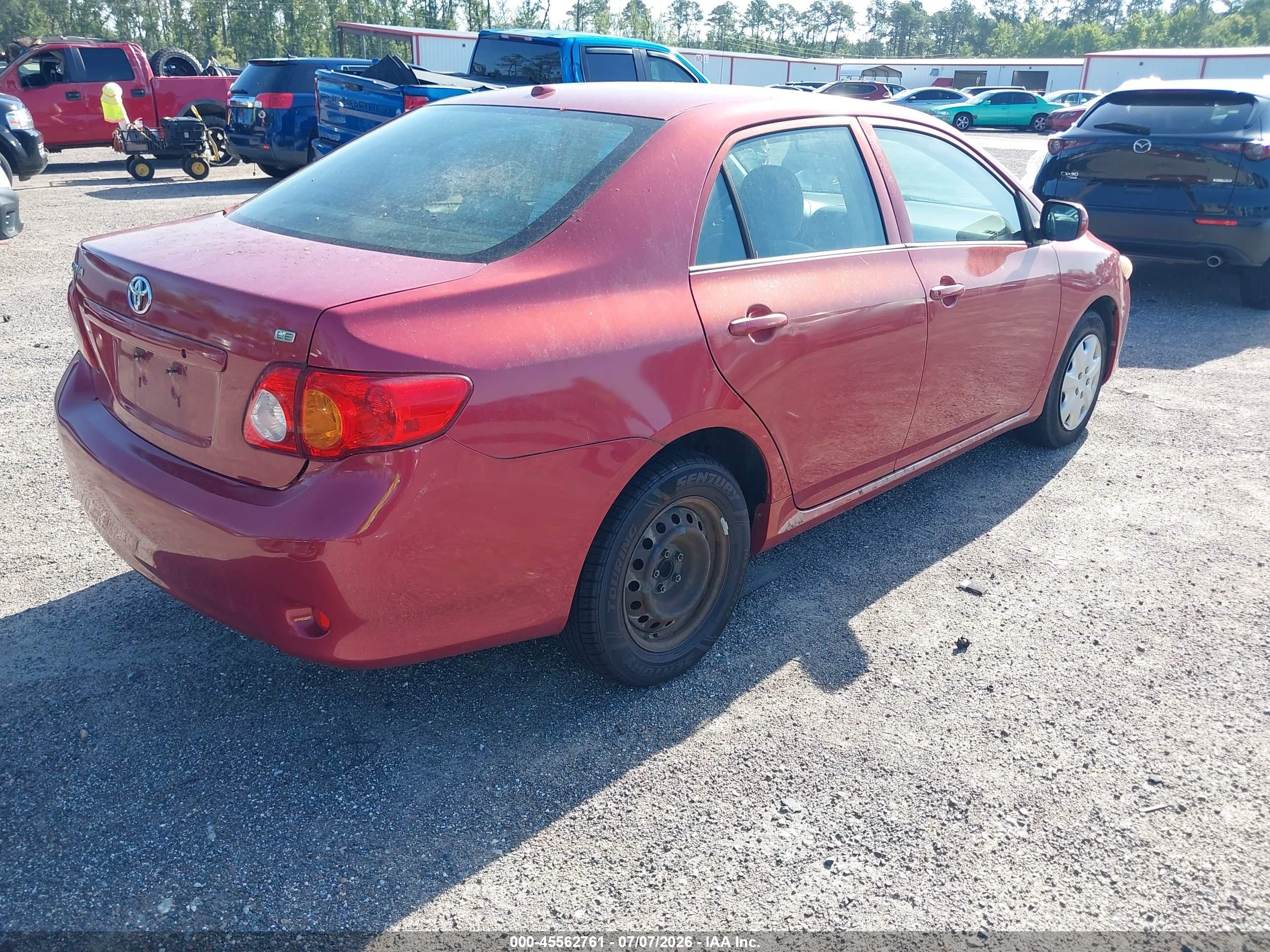 2009 Toyota Corolla Le Red vin: JTDBL40E599023124