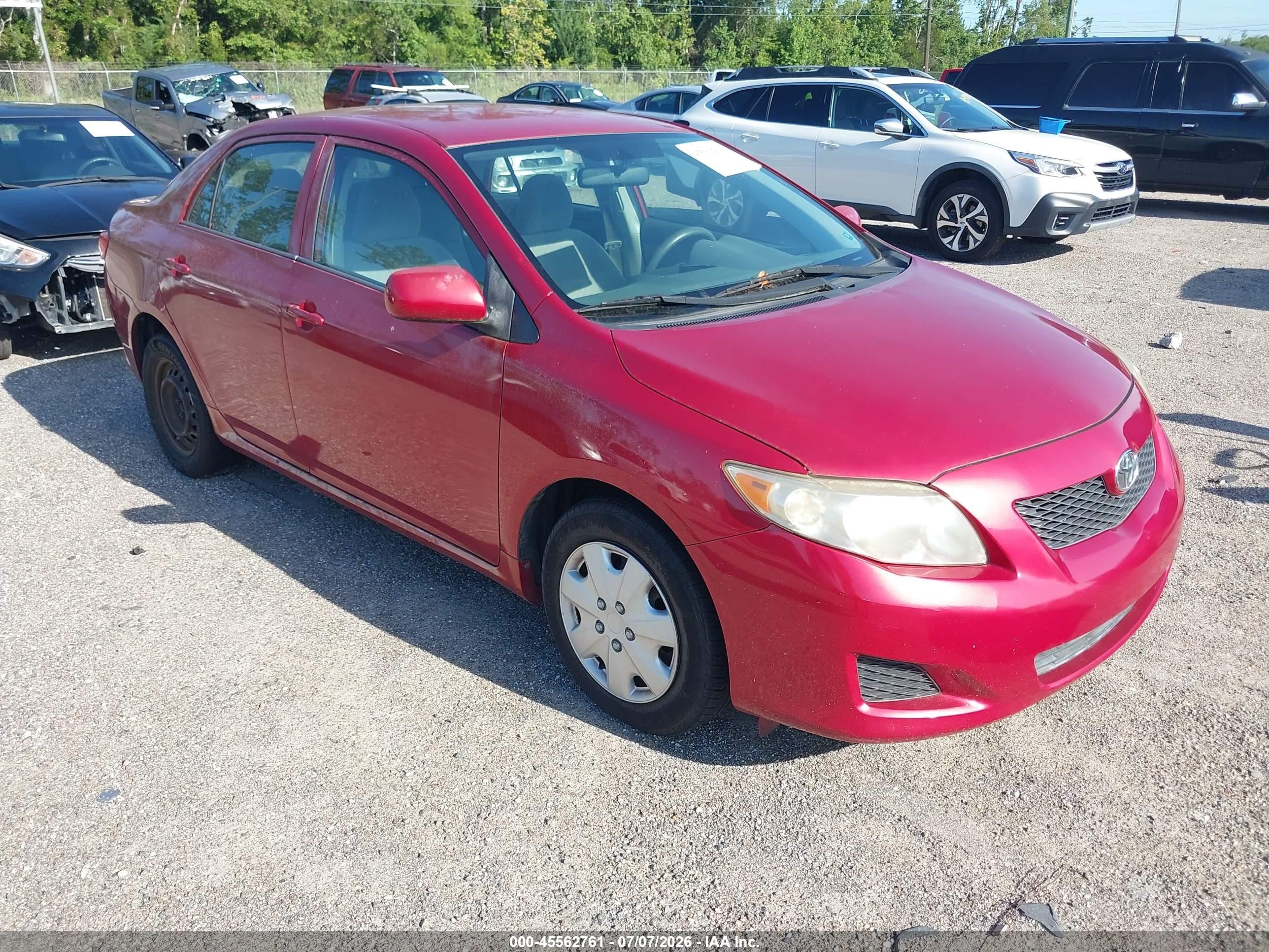 2009 Toyota Corolla Le Red vin: JTDBL40E599023124