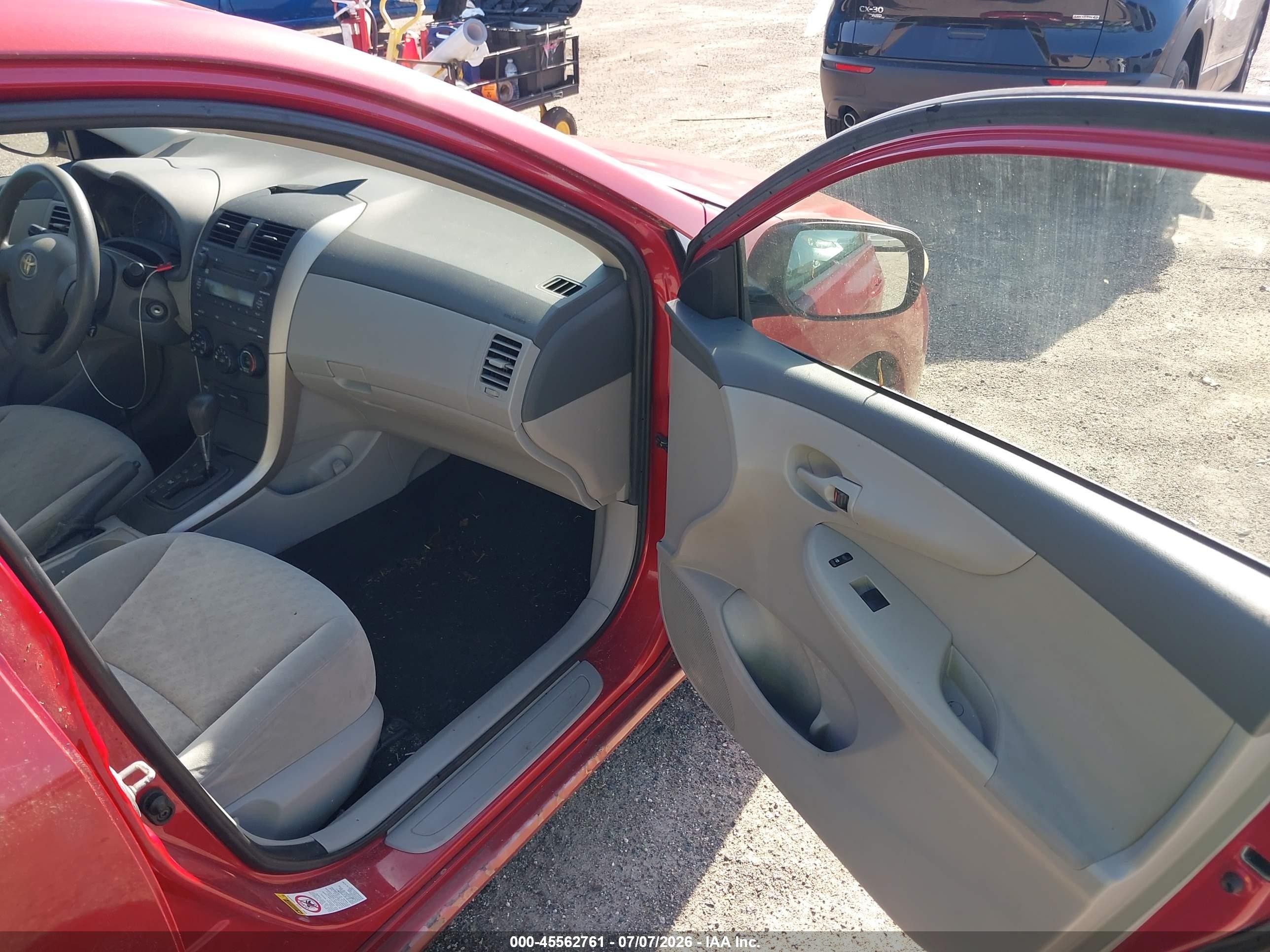 2009 Toyota Corolla Le Red vin: JTDBL40E599023124