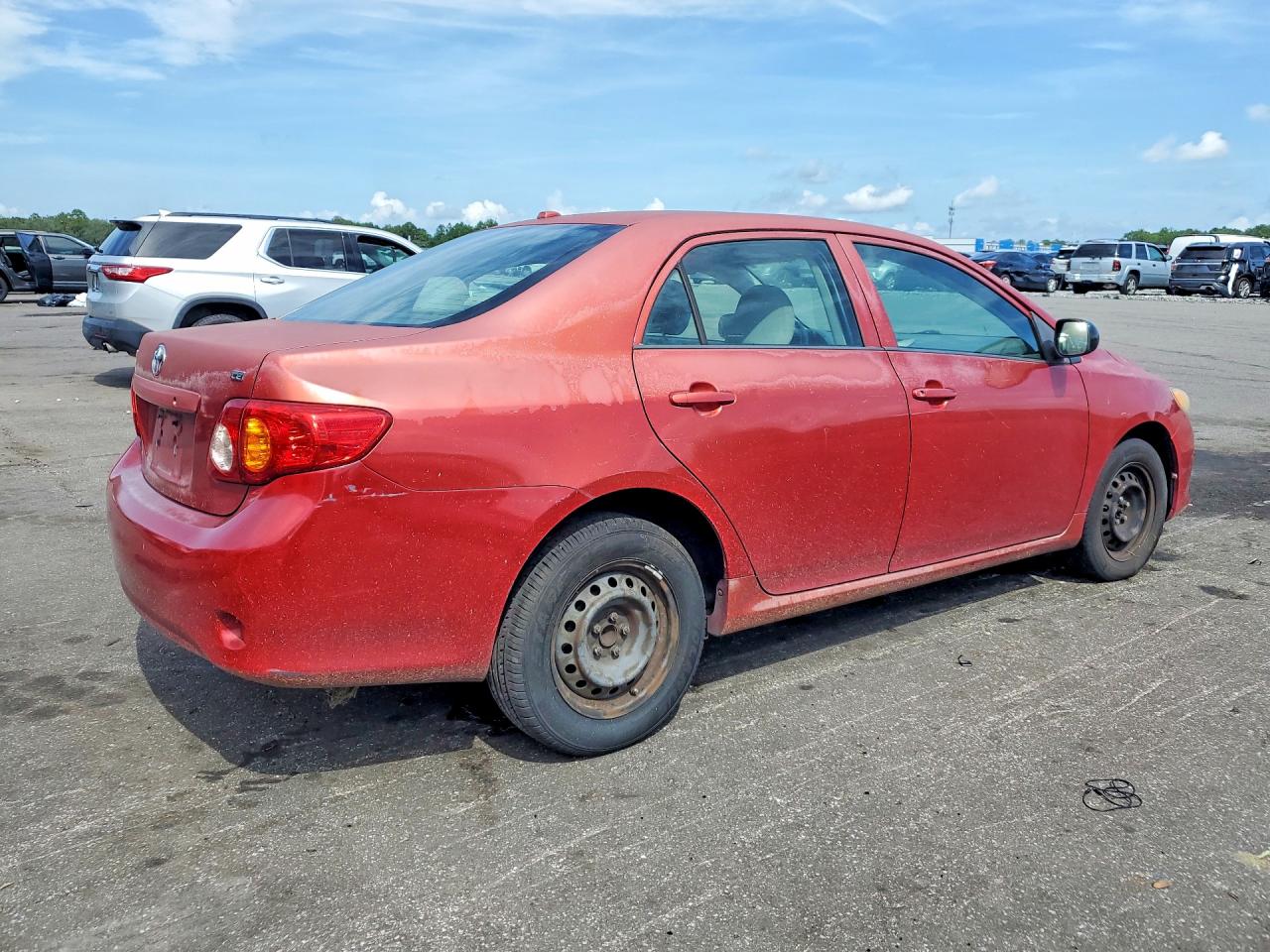 2009 Toyota Corolla Le Red vin: JTDBL40E599061775