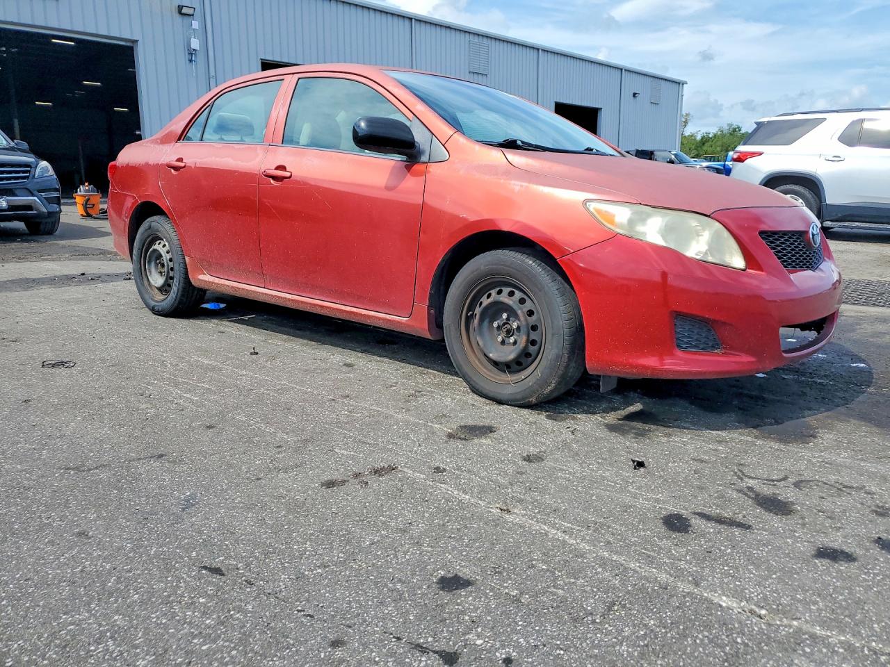 2009 Toyota Corolla Le Red vin: JTDBL40E599061775