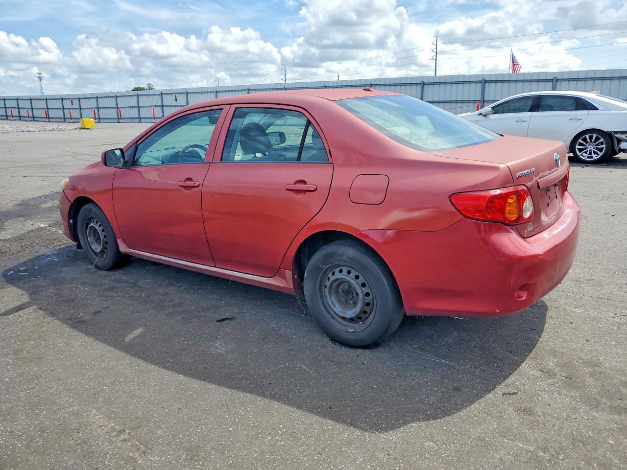 2009 Toyota Corolla Le Red vin: JTDBL40E599061775