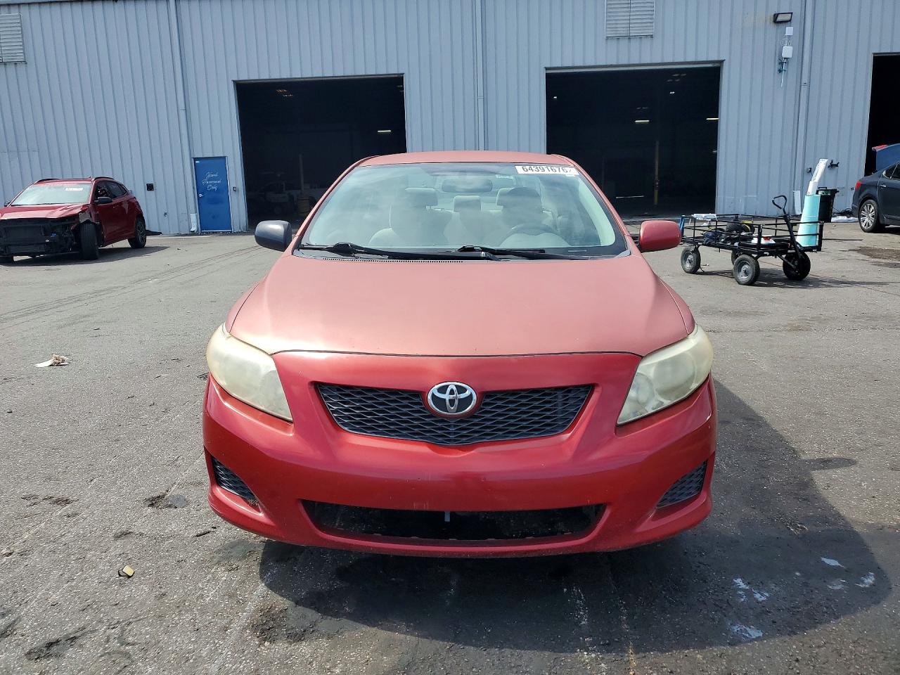 2009 Toyota Corolla Le Red vin: JTDBL40E599061775