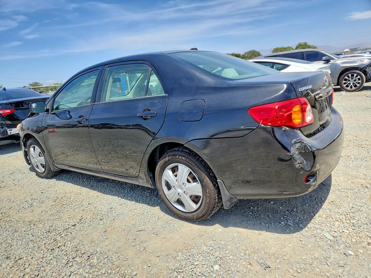 2009 Toyota Corolla Le Black vin: JTDBL40E599078768