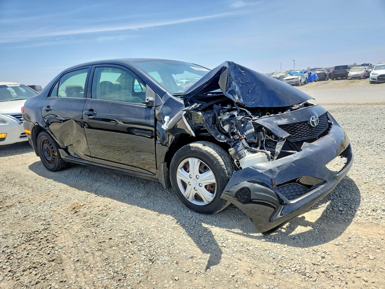 2009 Toyota Corolla Le Black vin: JTDBL40E599078768