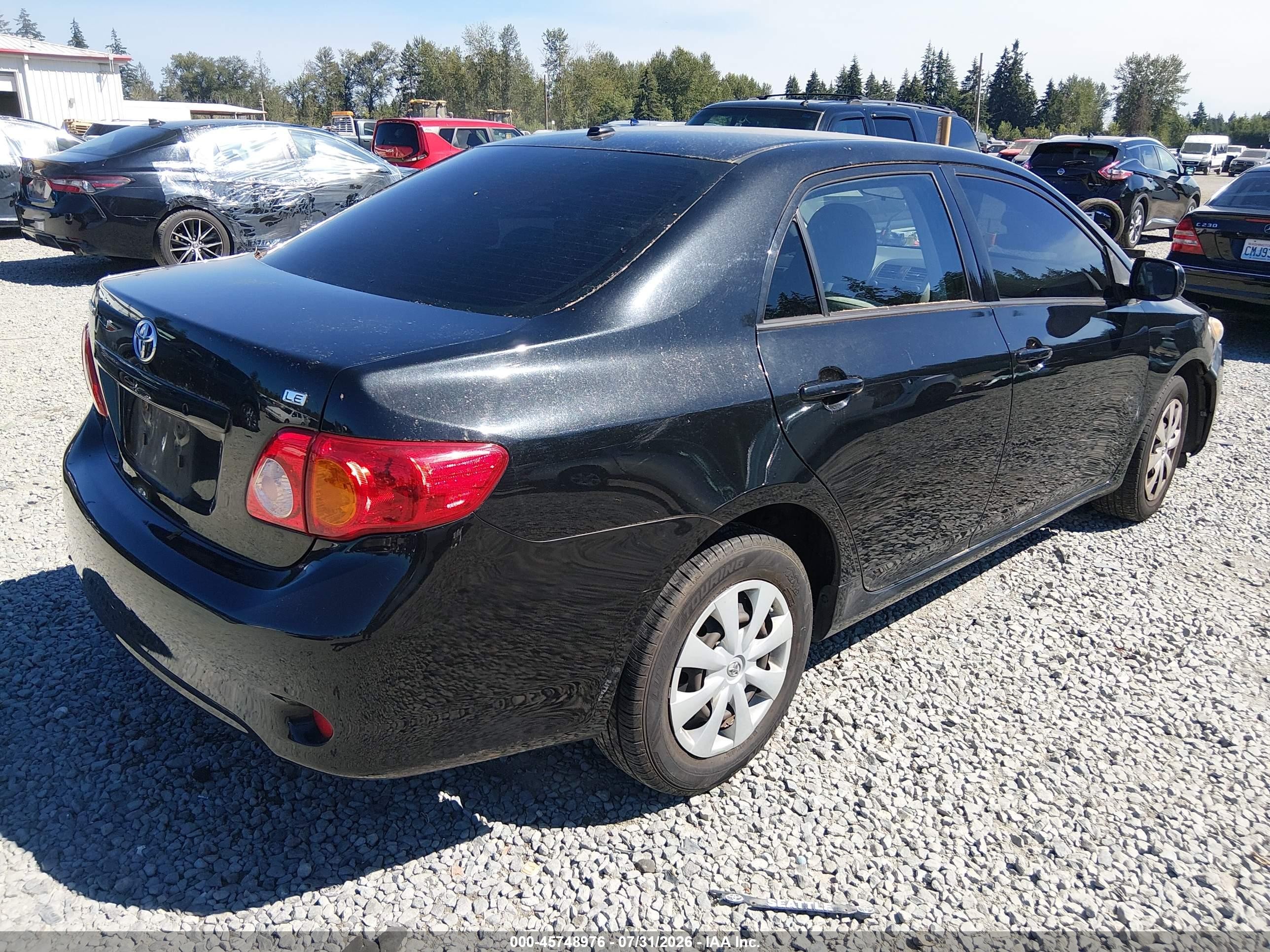 2009 Toyota Corolla Le Black vin: JTDBL40E599092170