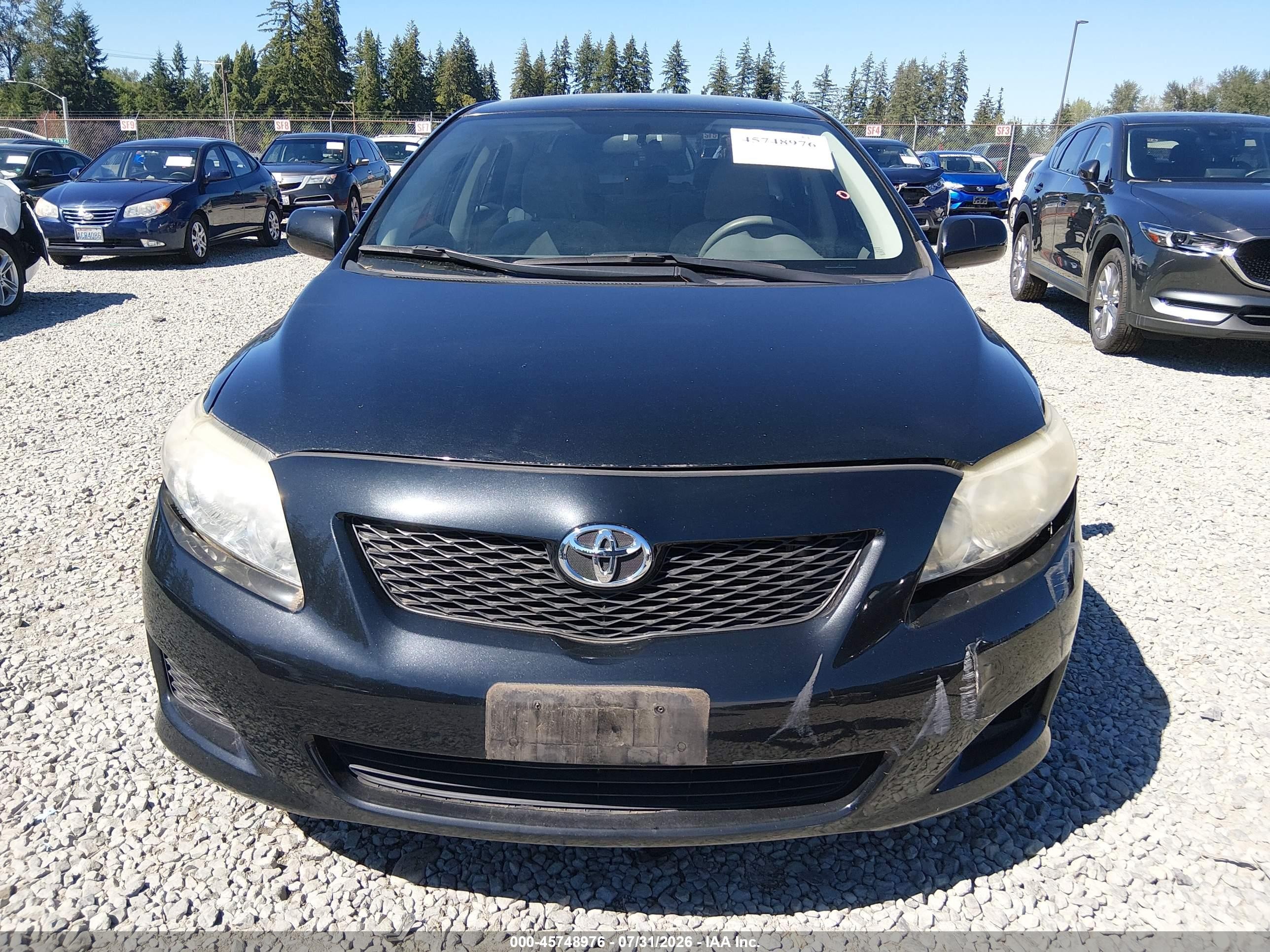 2009 Toyota Corolla Le Black vin: JTDBL40E599092170