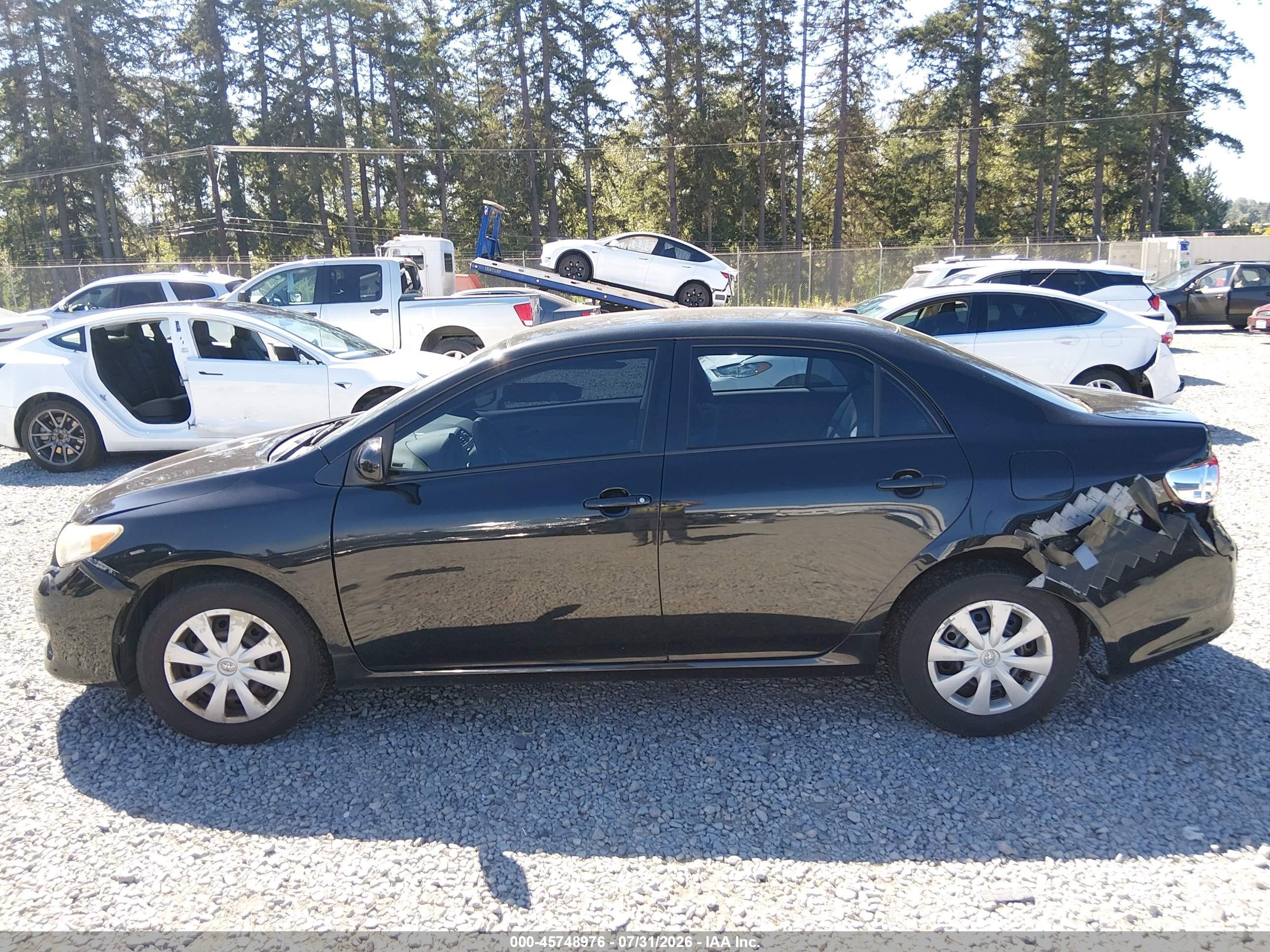 2009 Toyota Corolla Le Black vin: JTDBL40E599092170