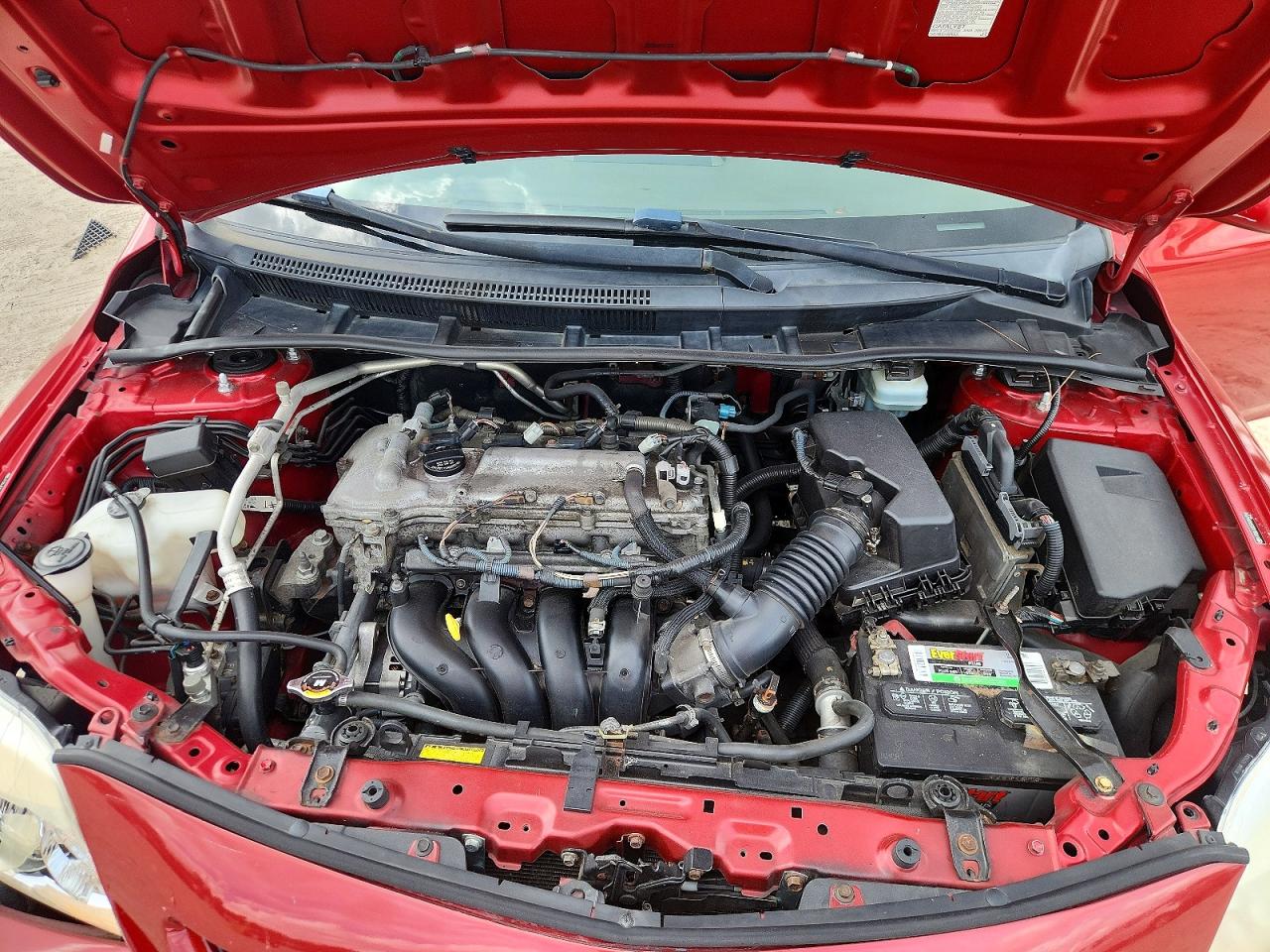 2009 Toyota Corolla Le Red vin: JTDBL40E599094758