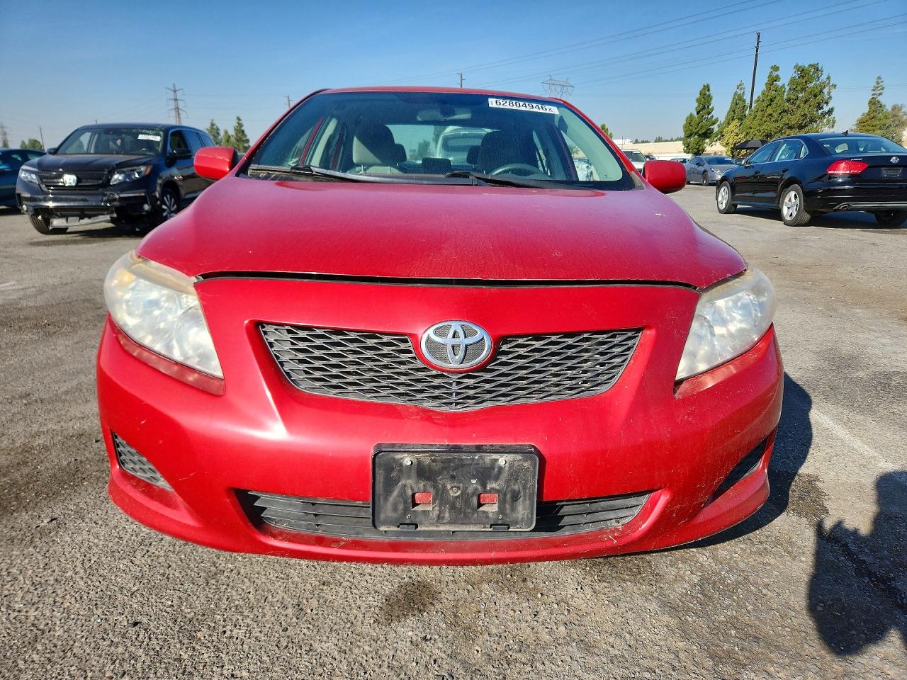2009 Toyota Corolla Le Красный vin: JTDBL40E59J004605