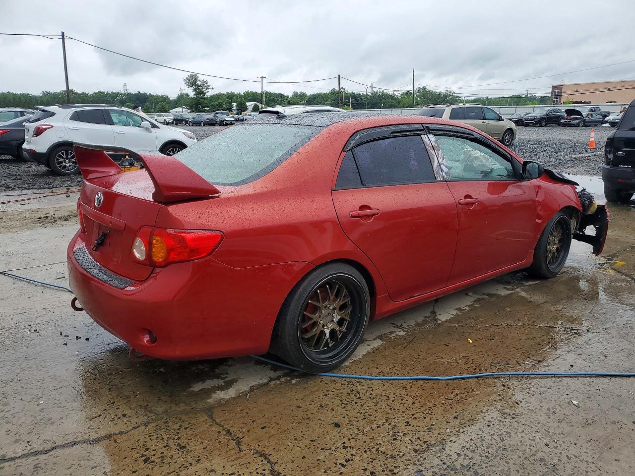 2009 Toyota Corolla Le Red vin: JTDBL40E699032060