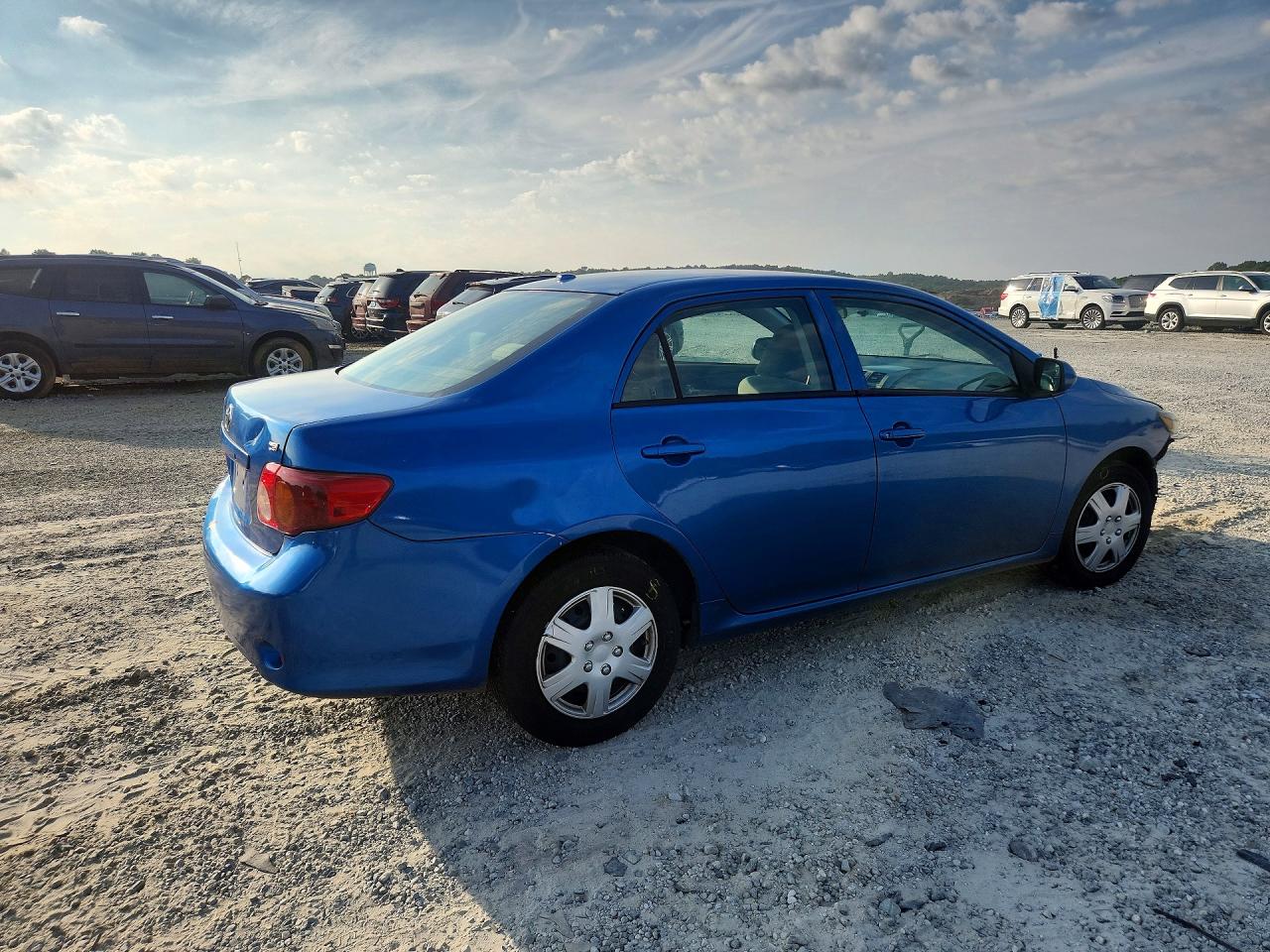 2009 Toyota Corolla Le Синий vin: JTDBL40E699055161