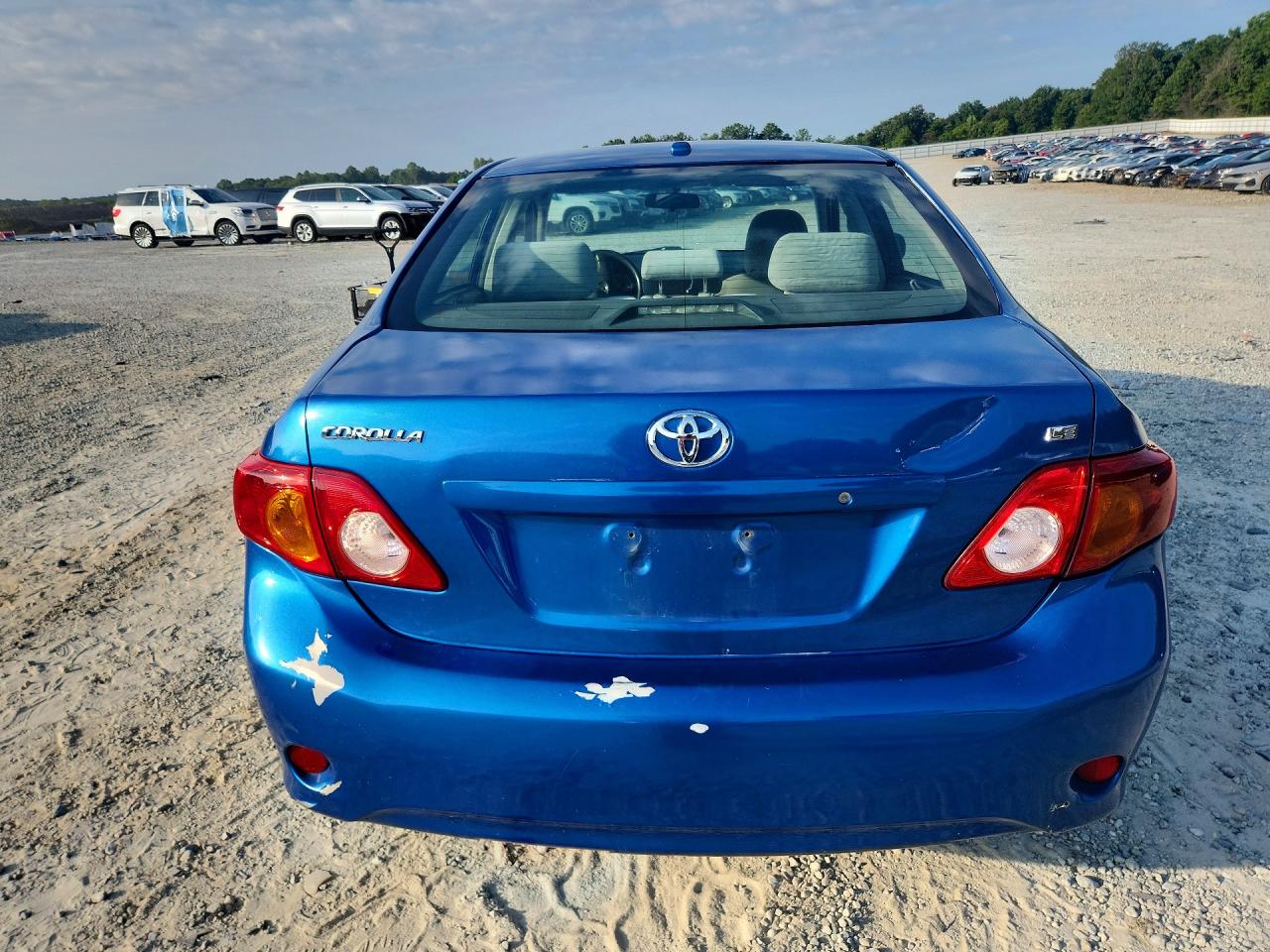 2009 Toyota Corolla Le Синий vin: JTDBL40E699055161