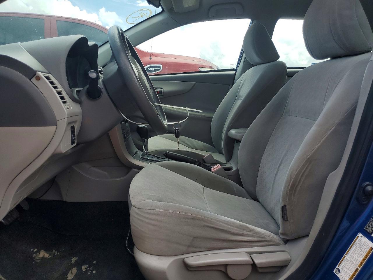 2009 Toyota Corolla Le Синий vin: JTDBL40E699055161