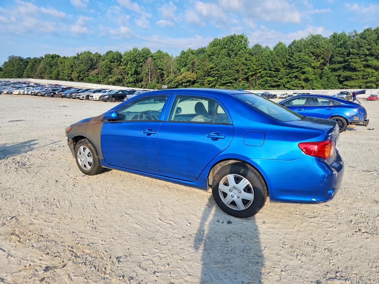 2009 Toyota Corolla Le Синий vin: JTDBL40E699055161