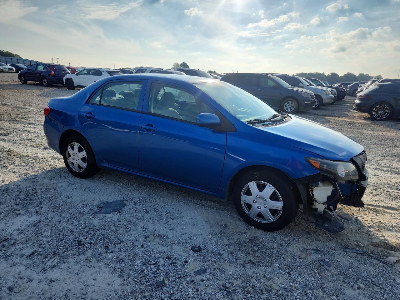 2009 Toyota Corolla Le Синий vin: JTDBL40E699055161