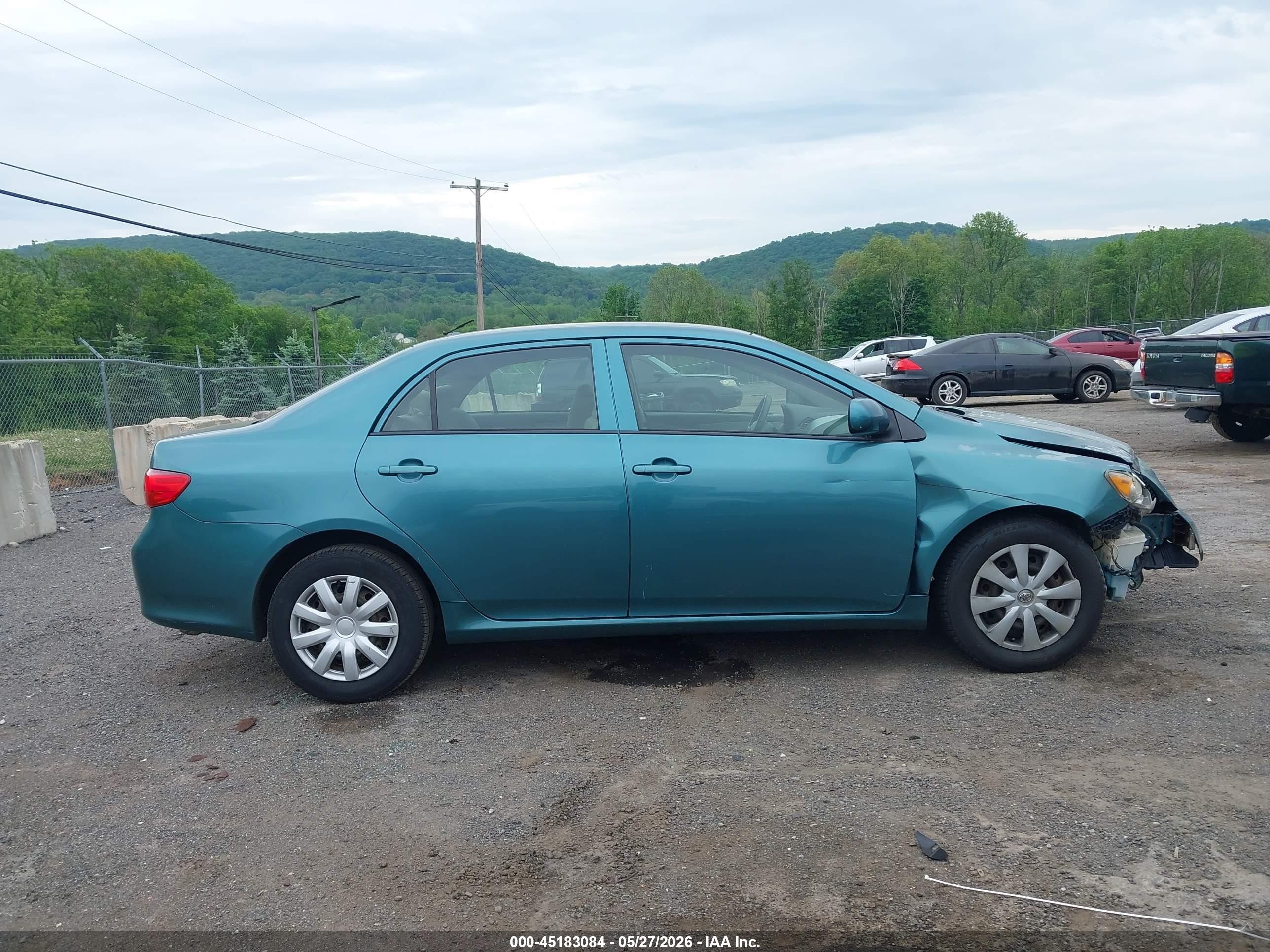 2009 Toyota Corolla Le Green vin: JTDBL40E699077516