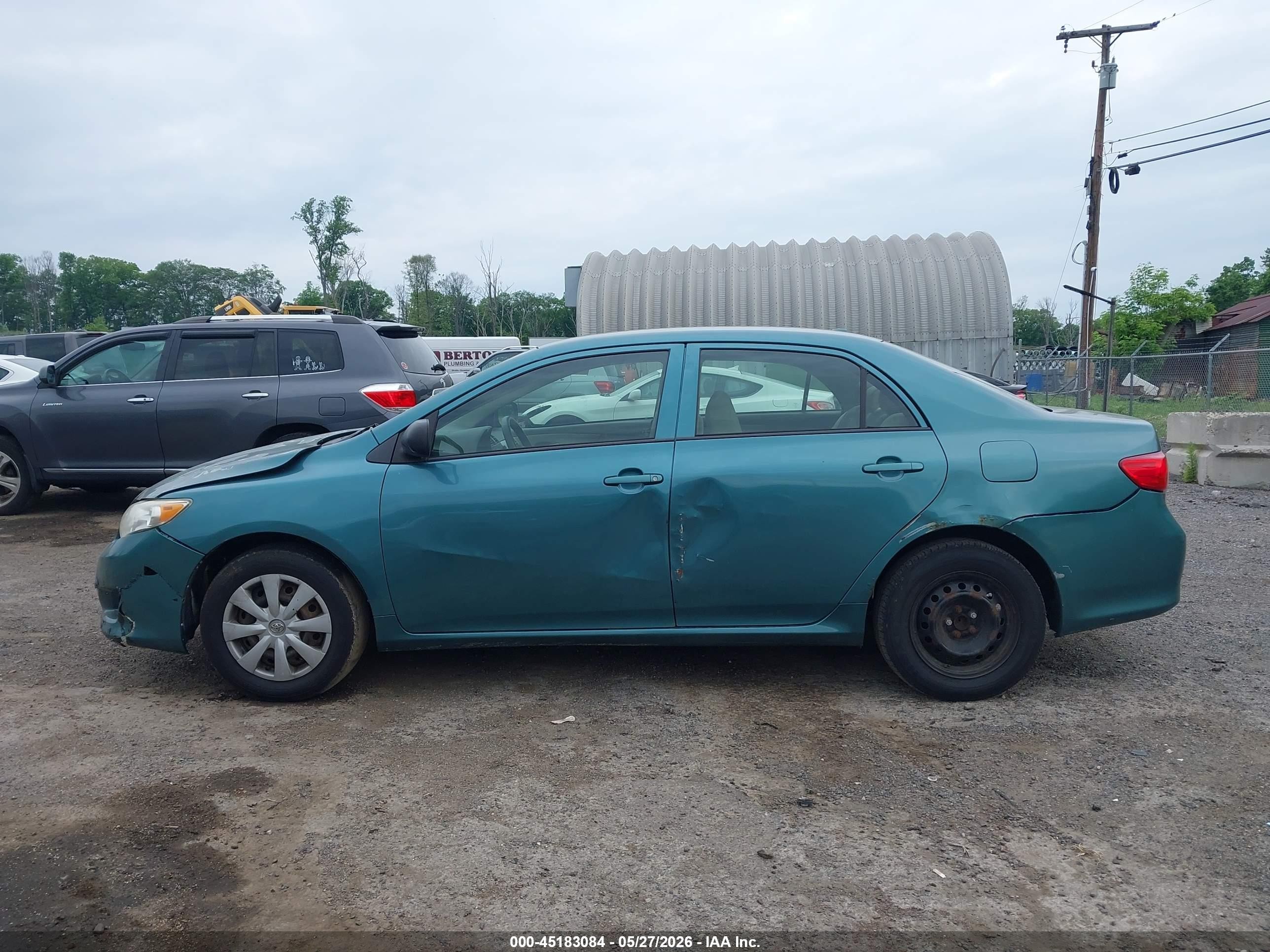 2009 Toyota Corolla Le Green vin: JTDBL40E699077516