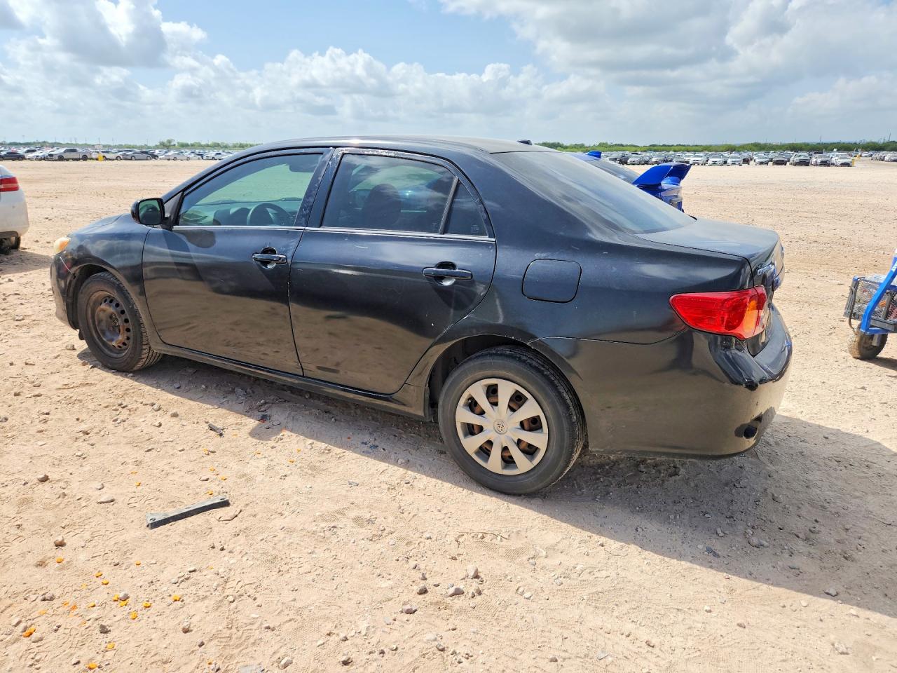 2009 Toyota Corolla Le Black vin: JTDBL40E699087852