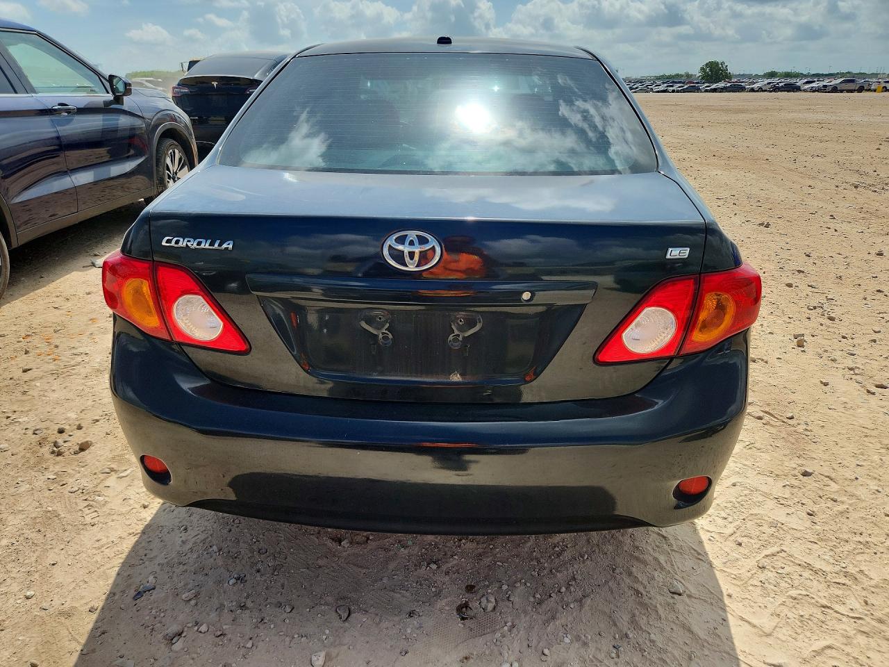 2009 Toyota Corolla Le Black vin: JTDBL40E699087852