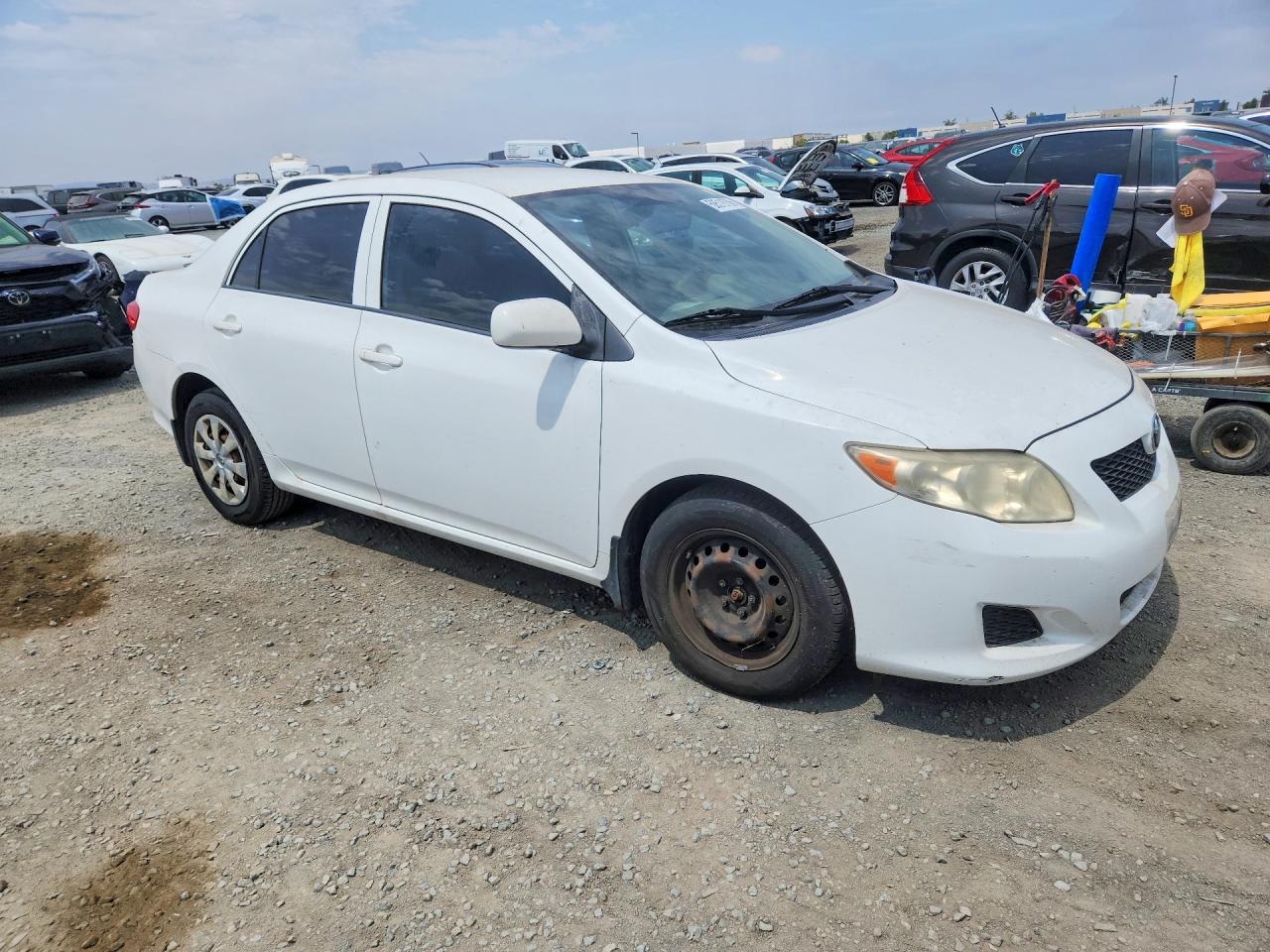 2009 Toyota Corolla Le White vin: JTDBL40E699093893