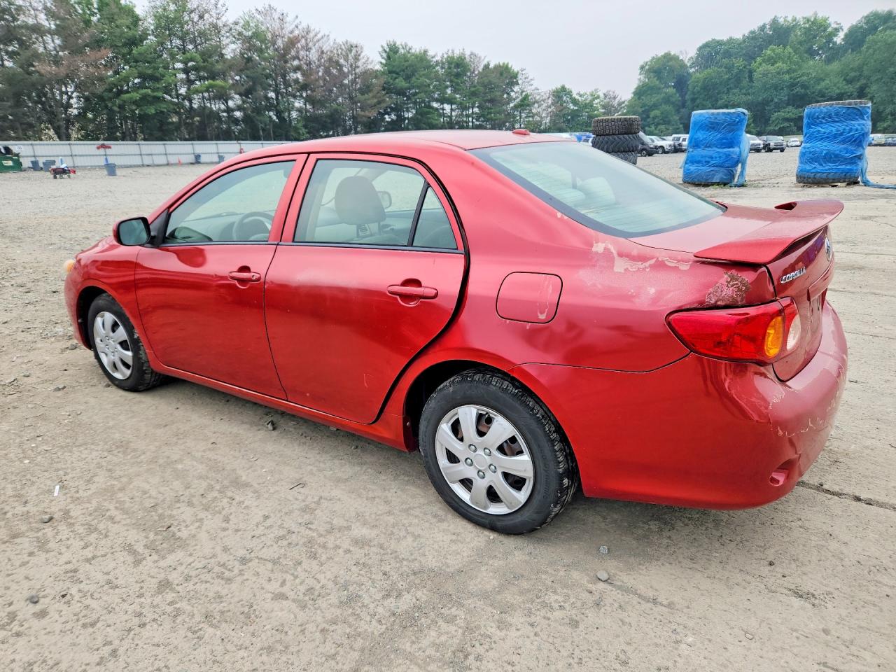 2009 Toyota Corolla Le Красный vin: JTDBL40E69J008940