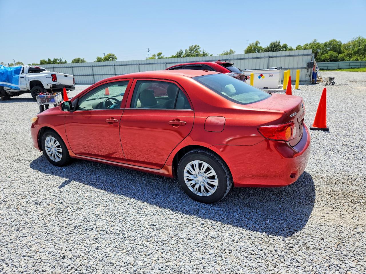 2009 Toyota Corolla Le Red vin: JTDBL40E69J024460