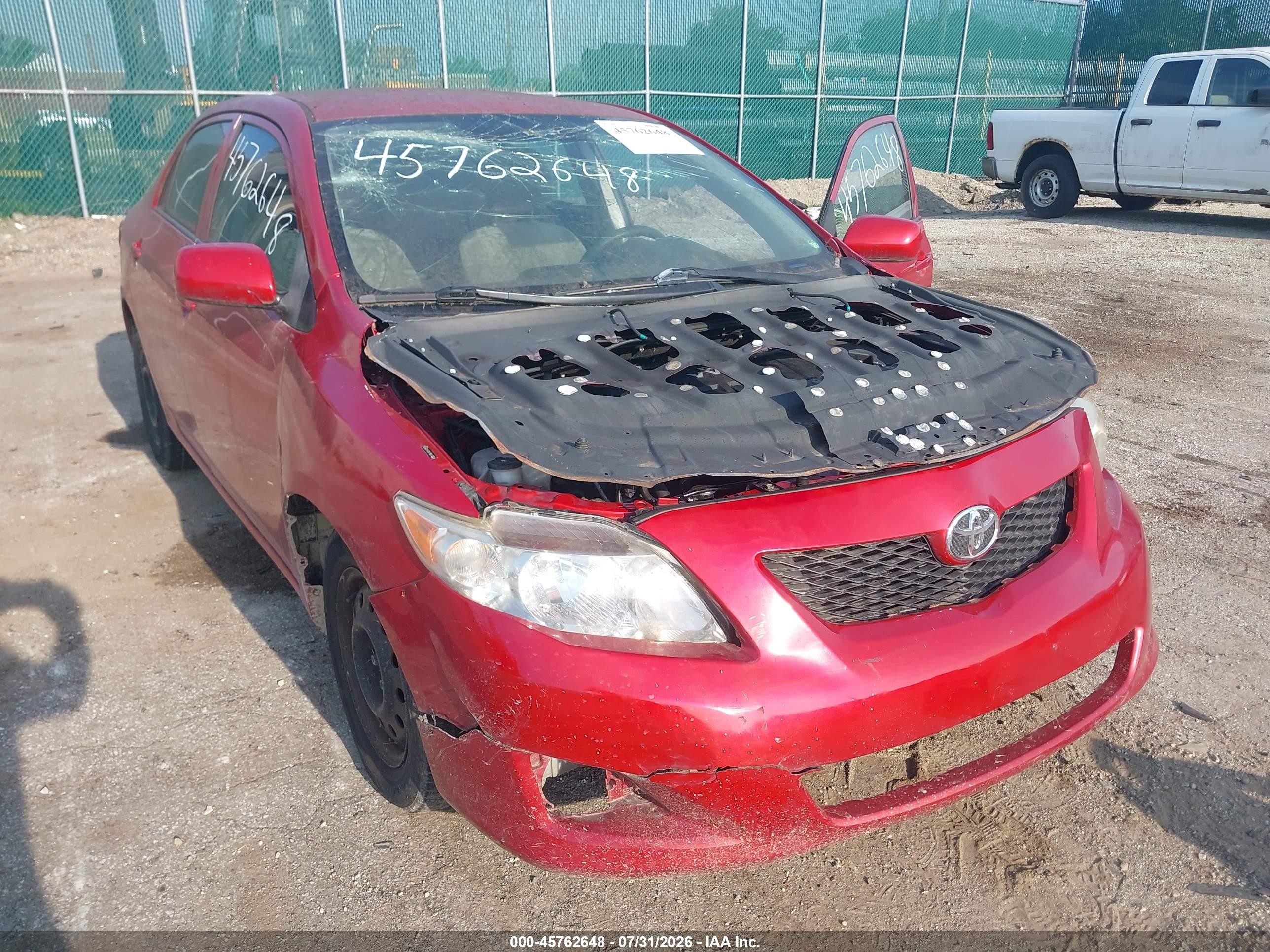 2009 Toyota Corolla Le Red vin: JTDBL40E69J039783