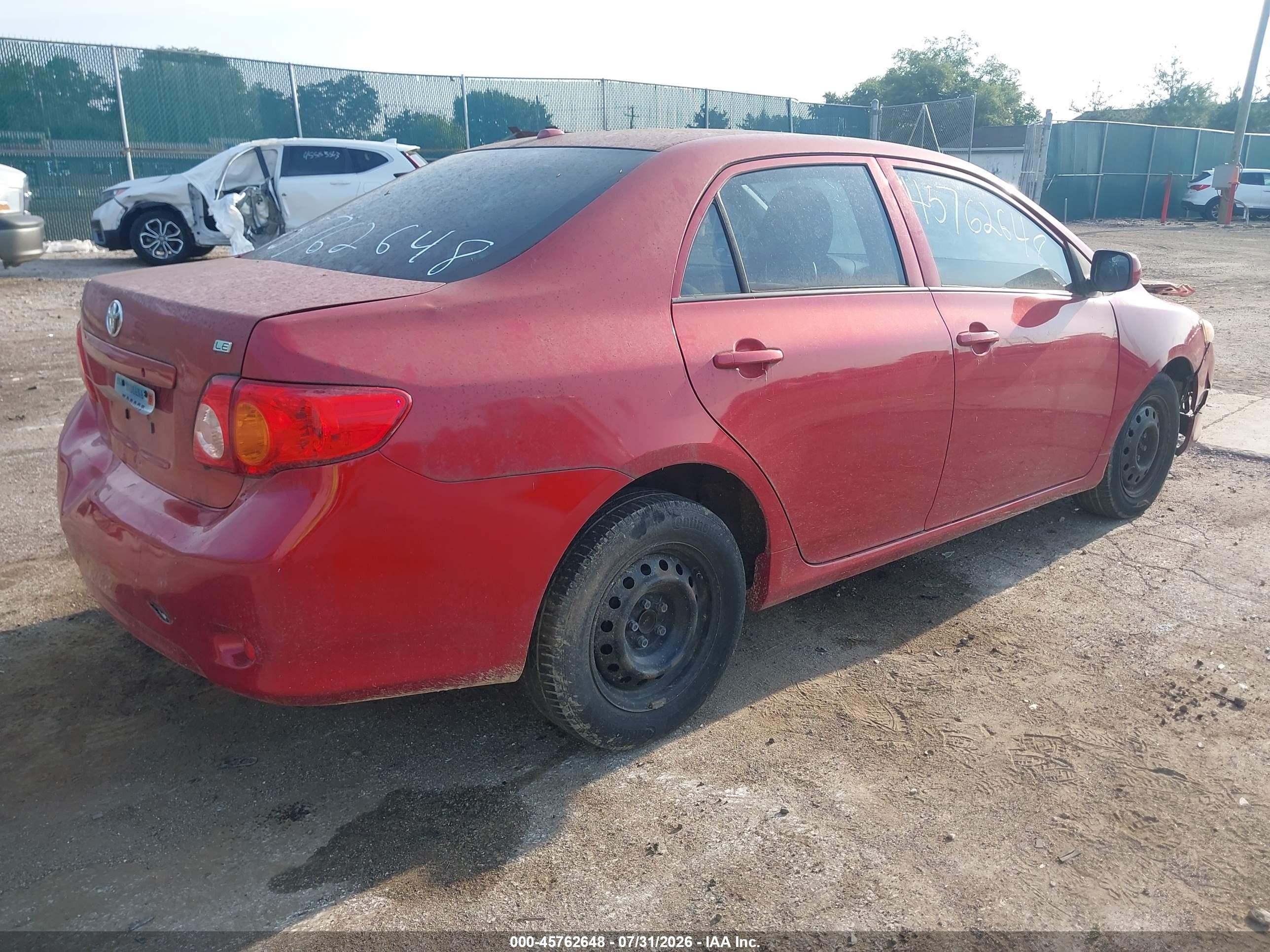 2009 Toyota Corolla Le Red vin: JTDBL40E69J039783