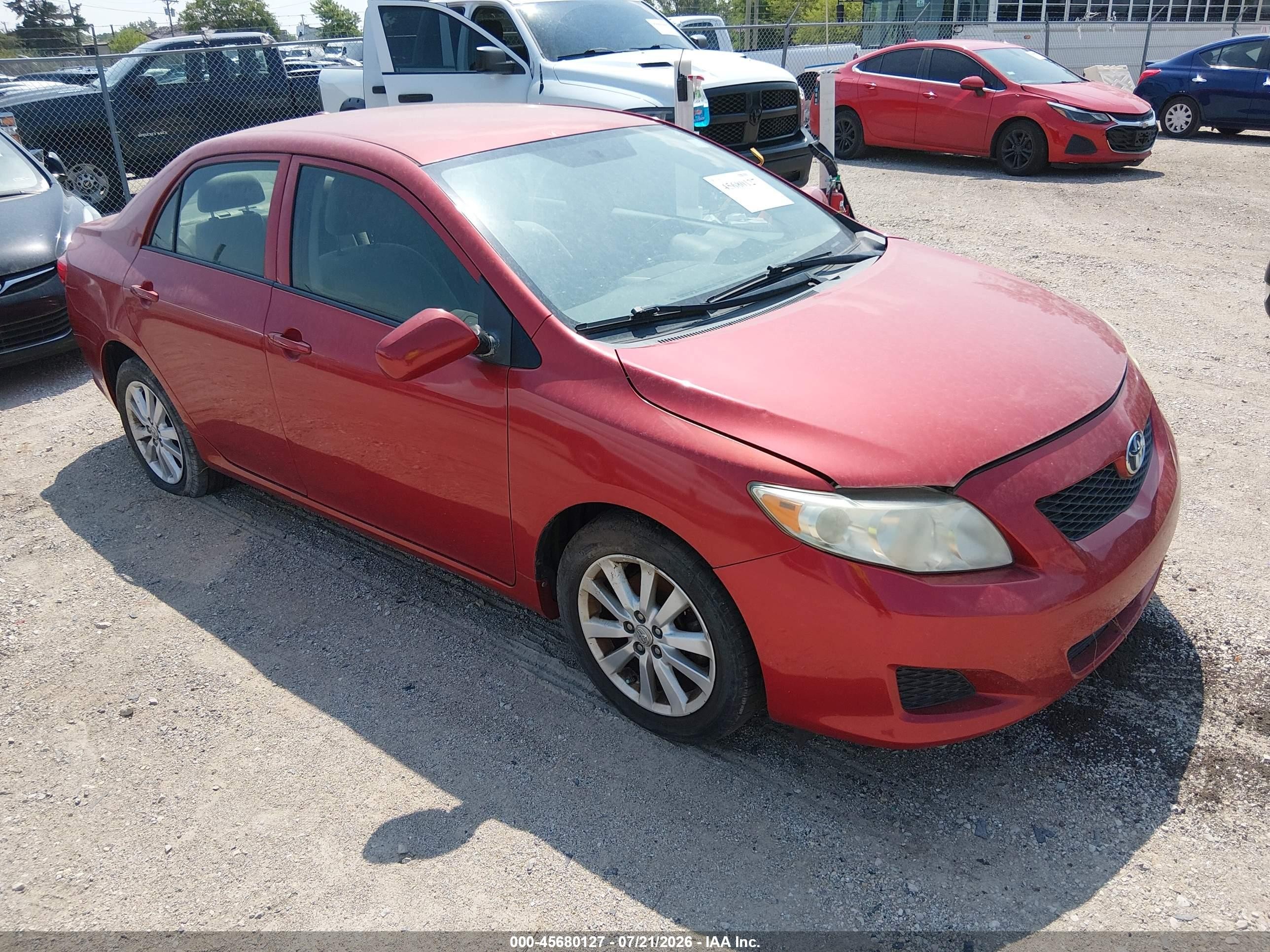 2009 Toyota Corolla Le Красный vin: JTDBL40E69J044742