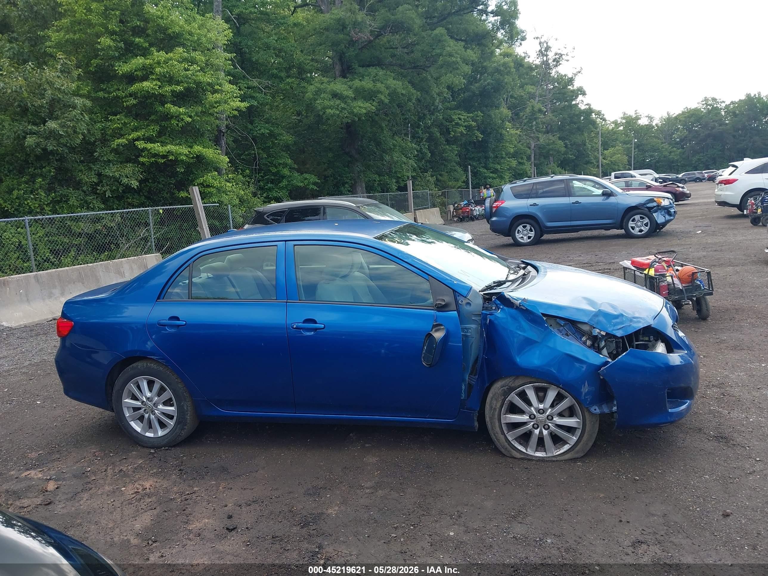 2009 Toyota Corolla Le Blue vin: JTDBL40E799061311