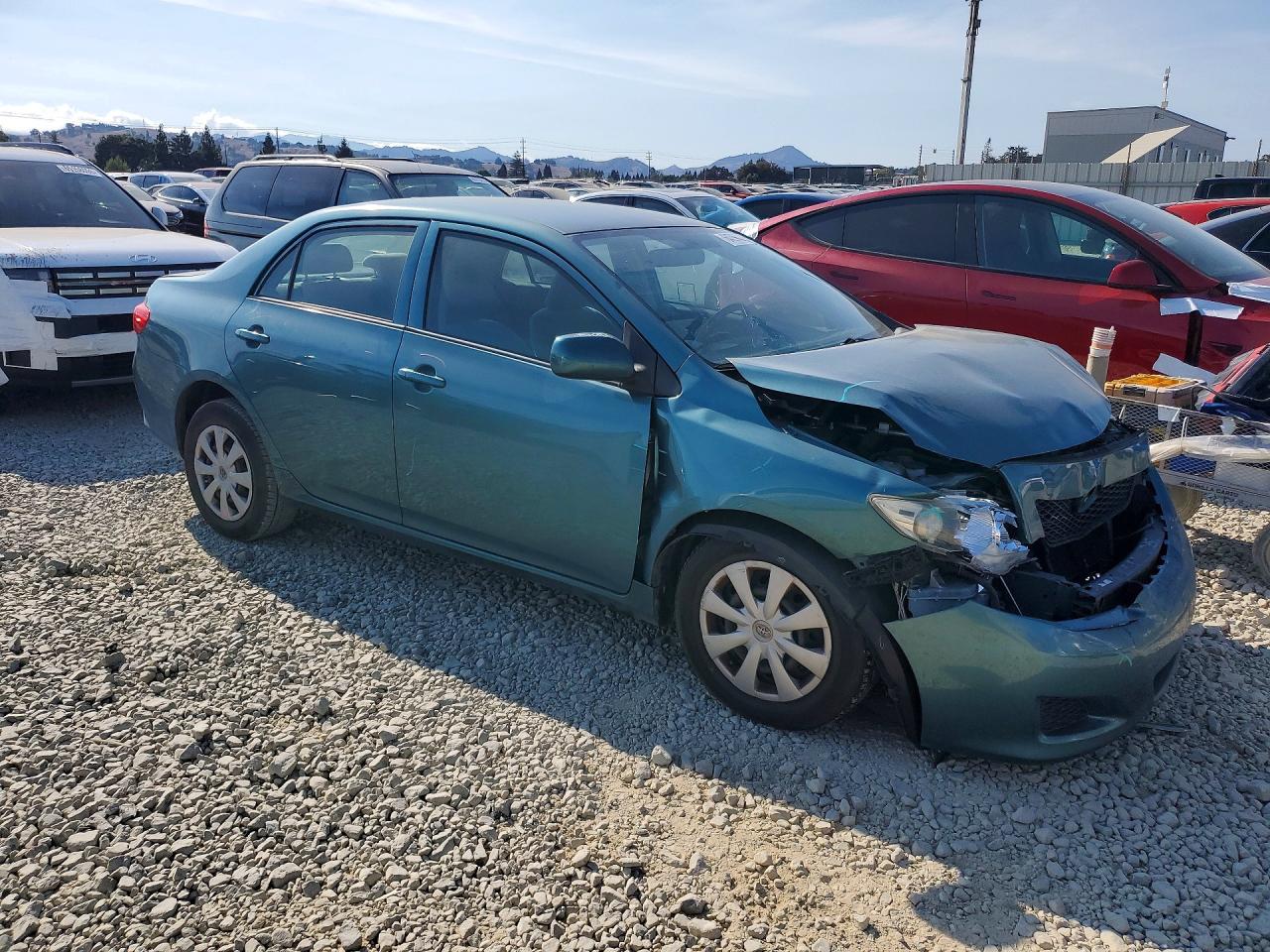 2009 Toyota Corolla Le Teal vin: JTDBL40E799070932