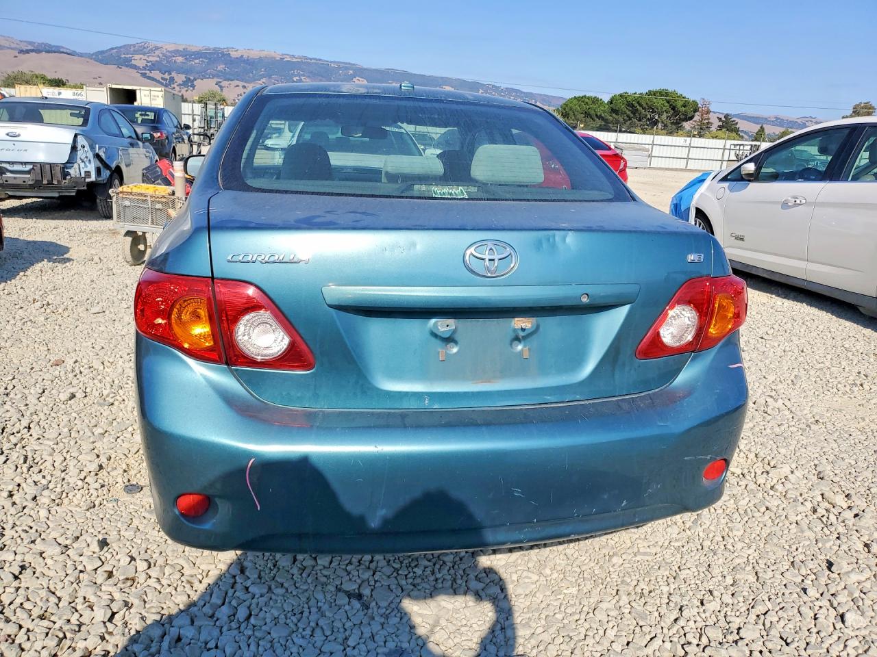 2009 Toyota Corolla Le Teal vin: JTDBL40E799070932