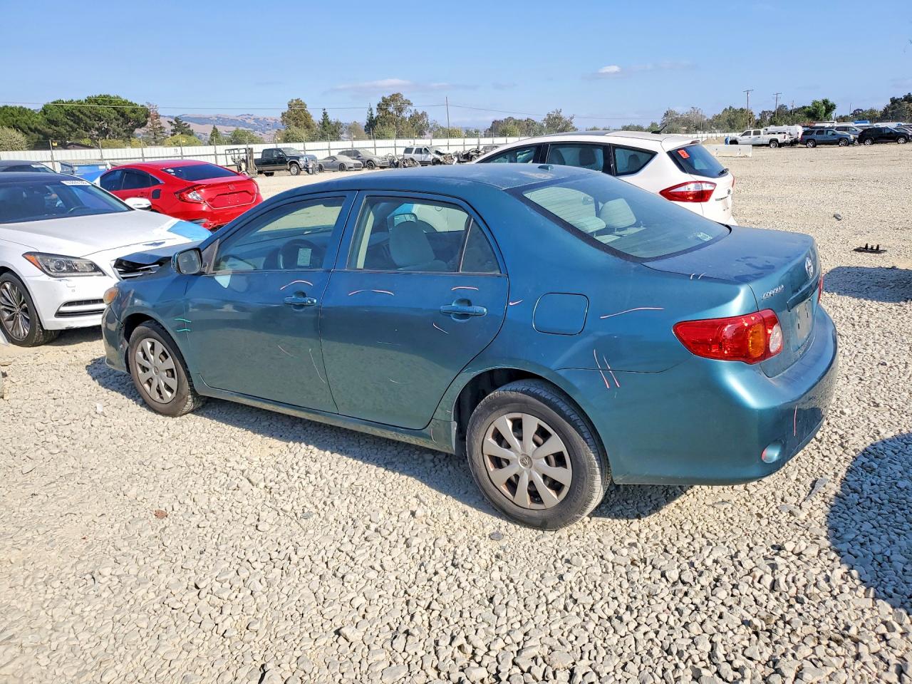 2009 Toyota Corolla Le Teal vin: JTDBL40E799070932