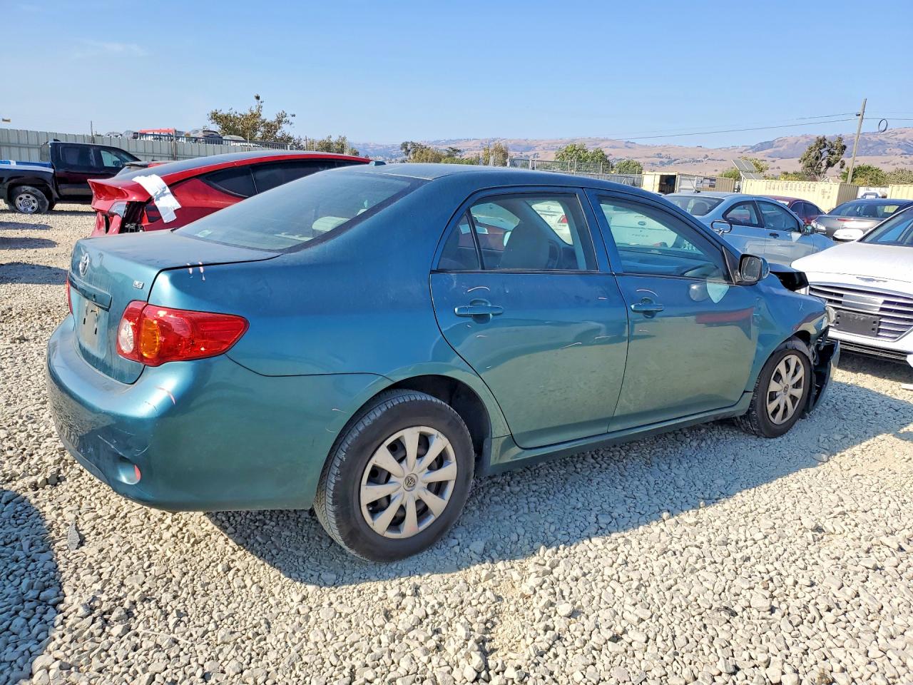 2009 Toyota Corolla Le Teal vin: JTDBL40E799070932