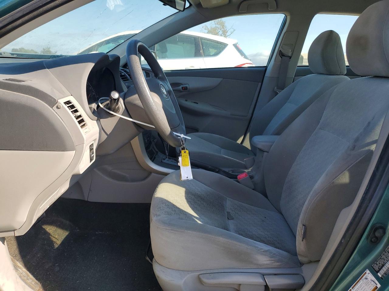 2009 Toyota Corolla Le Teal vin: JTDBL40E799070932