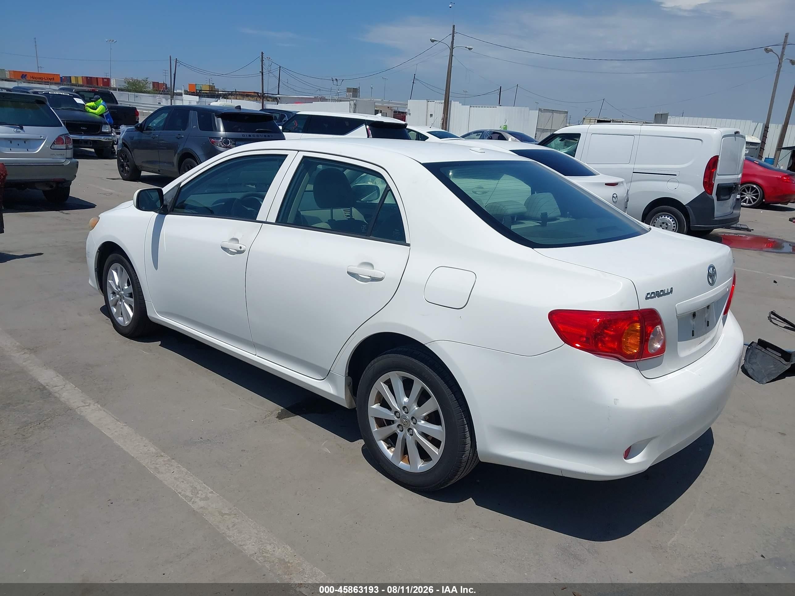 2009 Toyota Corolla Le Белый vin: JTDBL40E799071997