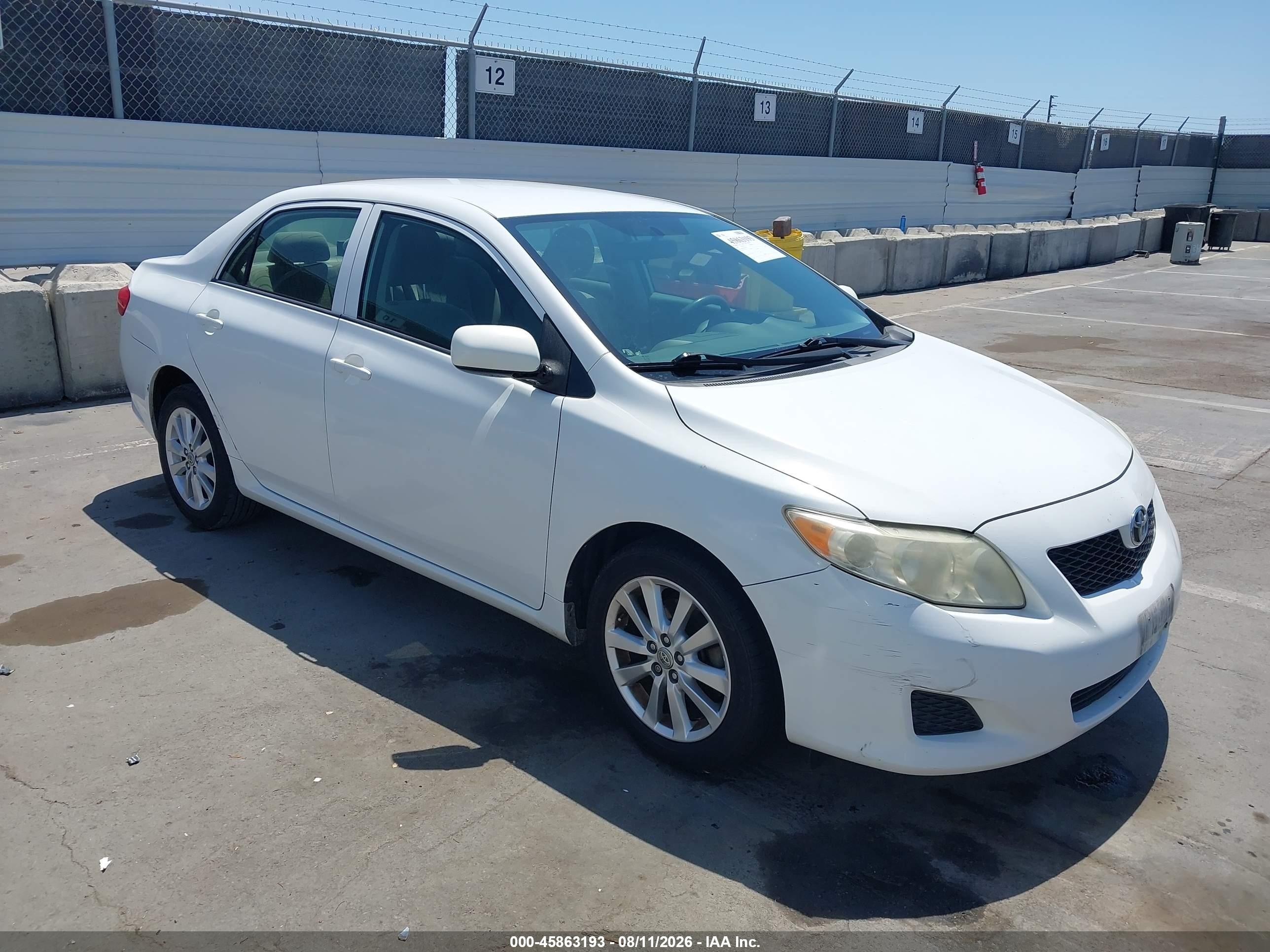 2009 Toyota Corolla Le Белый vin: JTDBL40E799071997