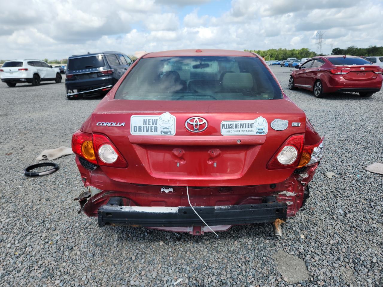 2009 Toyota Corolla Le Red vin: JTDBL40E79J032244