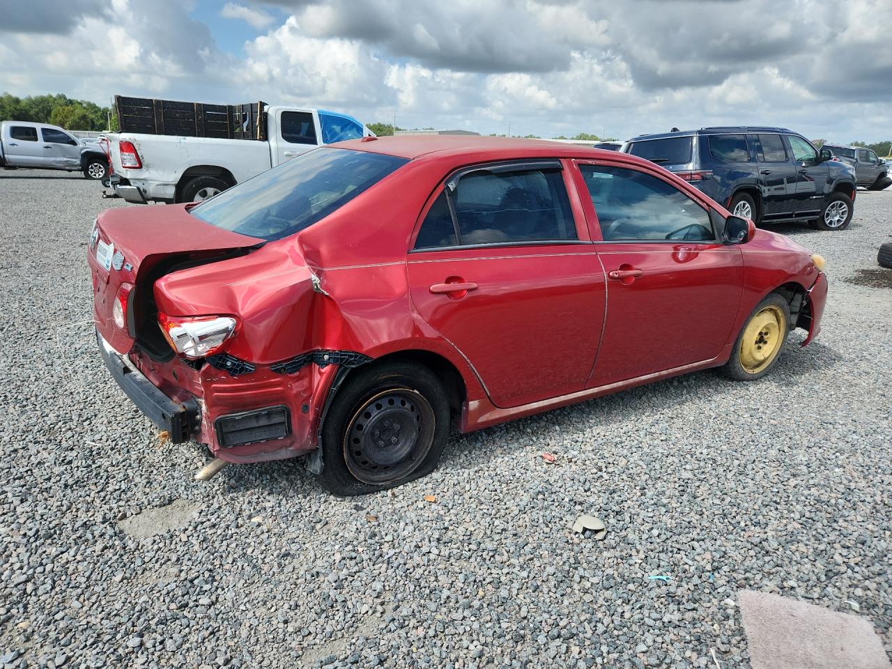 2009 Toyota Corolla Le Red vin: JTDBL40E79J032244
